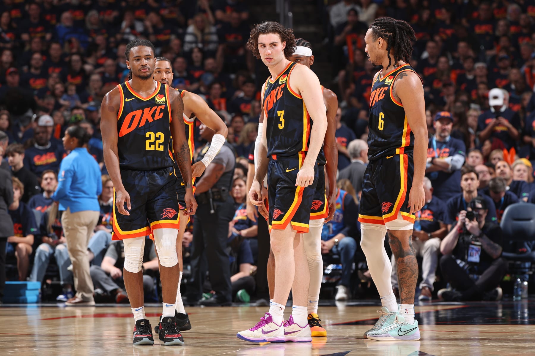 OKLAHOMA CITY, OK - MAY 15:  Cason Wallace #22 , Josh Giddey #3 and Jaylin Williams #6 of the Oklahoma City Thunder look on during the game against the Dallas Mavericks during Round 2 Game 5 of the 2024 NBA Playoffs on May 15, 2024 at Paycom Arena in Oklahoma City, Oklahoma. NOTE TO USER: User expressly acknowledges and agrees that, by downloading and or using this photograph, User is consenting to the terms and conditions of the Getty Images License Agreement. Mandatory Copyright Notice: Copyright 2024 NBAE (Photo by Joe Murphy/NBAE via Getty Images)