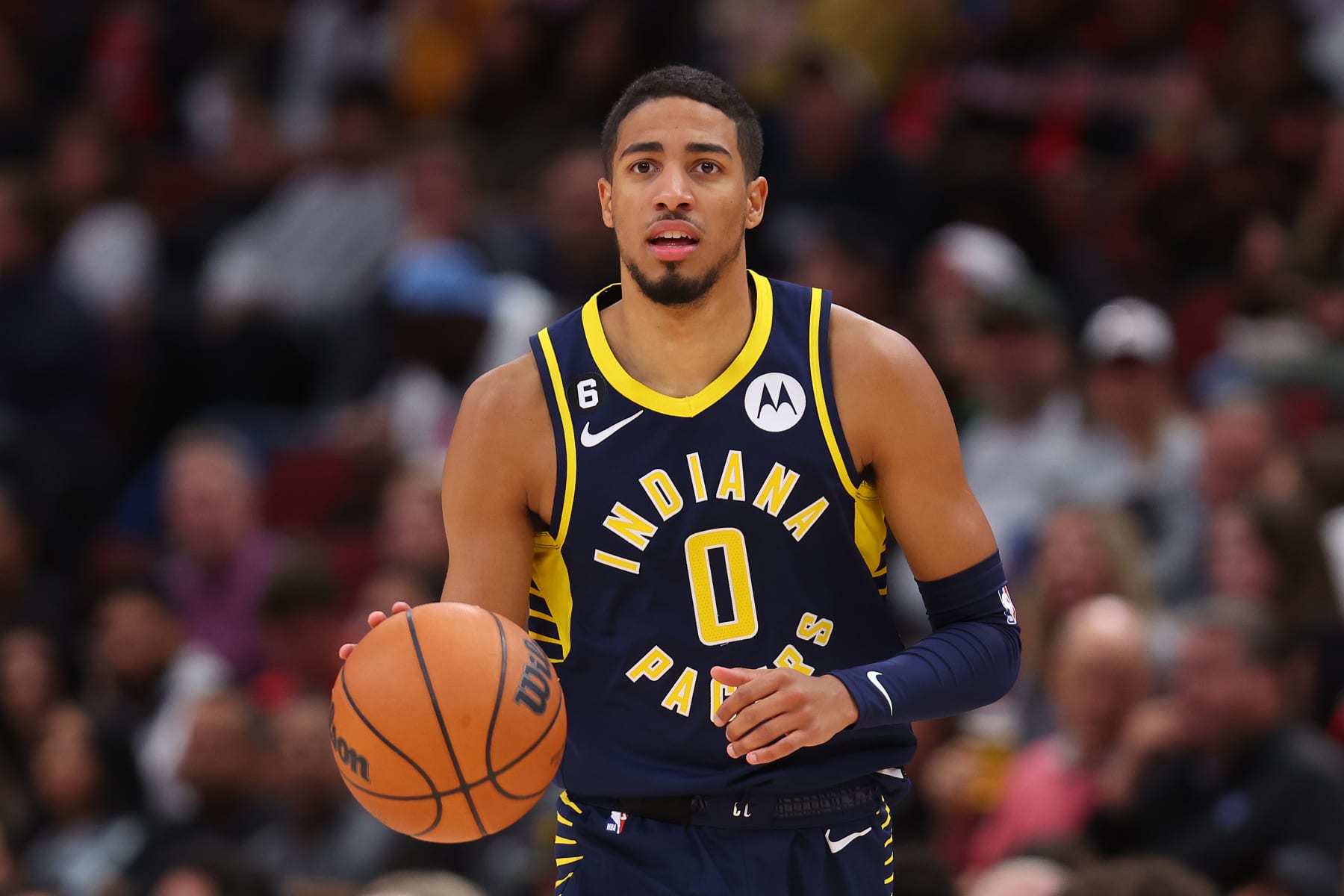 CHICAGO, ILLINOIS - OCTOBER 26: Tyrese Haliburton #0 of the Indiana Pacers dribbles up the court against the Chicago Bulls during the first half at United Center on October 26, 2022 in Chicago, Illinois. NOTE TO USER: User expressly acknowledges and agrees that, by downloading and or using this photograph, User is consenting to the terms and conditions of the Getty Images License Agreement. (Photo by Michael Reaves/Getty Images)