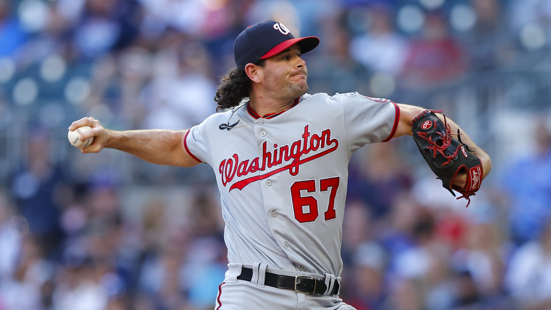 ATLANTA, GEORGIA - OCTOBER 1: Kyle Finnegan #67 of the Washington Nationals pitches during the ninth inning against the Atlanta Braves at Truist Park on October 1, 2023 in Atlanta, Georgia. (Photo by Todd Kirkland/Getty Images)