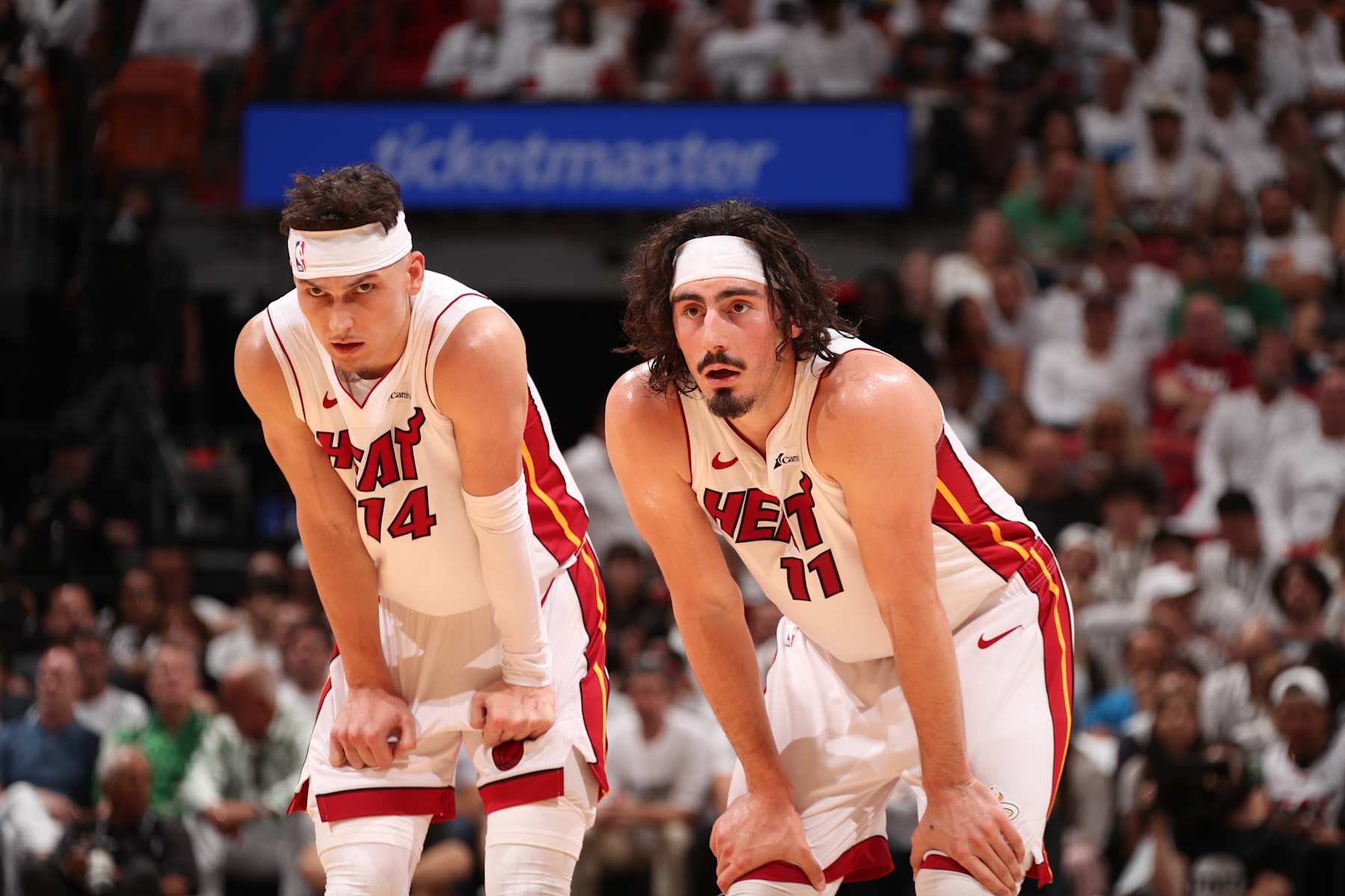 MIAMI, FL - APRIL 27: Jaime Jaquez Jr. #11 of the Miami Heat and Tyler Herro #14 look on during the game against the Boston Celtics during Round 1 Game 3 of the 2024 NBA Playoffs on April 27, 2024 at Kaseya Center in Miami, Florida. NOTE TO USER: User expressly acknowledges and agrees that, by downloading and or using this Photograph, user is consenting to the terms and conditions of the Getty Images License Agreement. Mandatory Copyright Notice: Copyright 2024 NBAE (Photo by Issac Baldizon/NBAE via Getty Images)