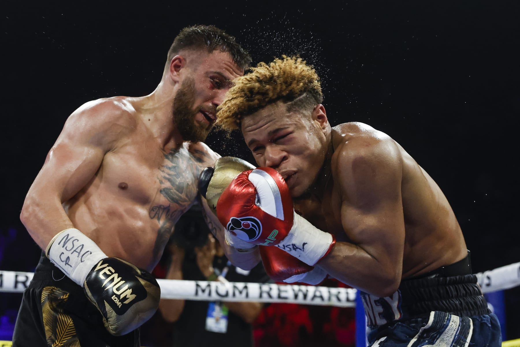 LAS VEGAS, NEVADA - MAY 20: Devin Haney exchanges punches with  Vasyl Lomachenko of Ukraine during their undisputed lightweight title bout at MGM Grand Garden Arena on May 20, 2023 in Las Vegas, Nevada. (Photo by Sarah Stier/Getty Images)