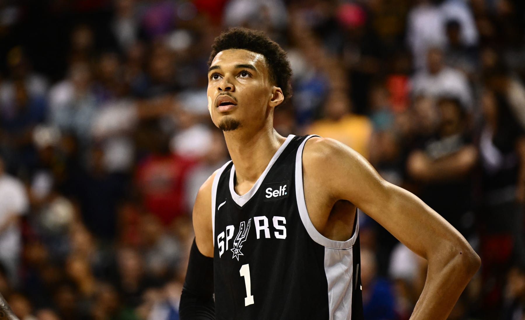 San Antonio Spurs' Victor Wembanyama looks on during the NBA Summer League game between the San Antonio Spurs and Portland Trail Blazers, at the Thomas and Mack Center in Las Vegas, Nevada, on July 9, 2023. (Photo by Patrick T. Fallon / AFP) (Photo by PATRICK T. FALLON/AFP via Getty Images)