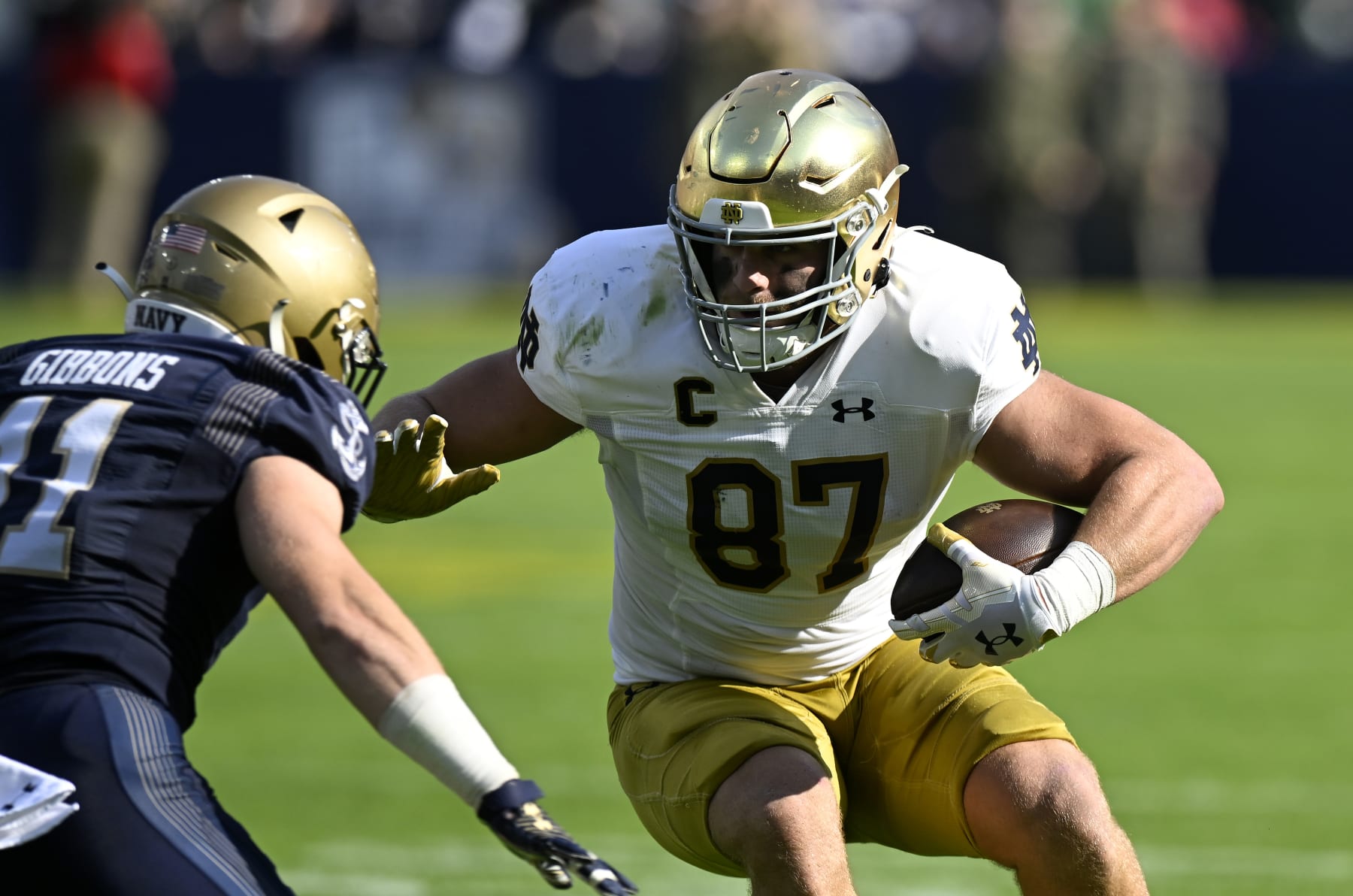 BALTIMORE, MARYLAND - NOVEMBER 12: Michael Mayer #87 of the Notre Dame Fighting Irish runs with the ball after making a catch against the Navy Midshipmen at M&T Bank Stadium on November 12, 2022 in Baltimore, Maryland. (Photo by G Fiume/Getty Images)