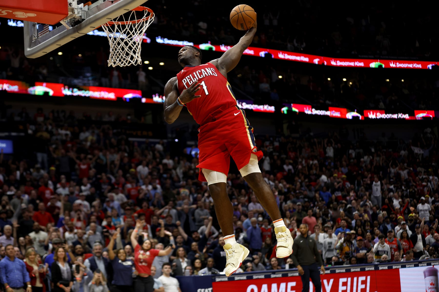 NEW ORLEANS, LOUISIANA - DECEMBER 09: Zion Williamson #1 of the New Orleans Pelicans dunks the ball during the fourth quarter of an NBA game against the Phoenix Suns at Smoothie King Center on December 09, 2022 in New Orleans, Louisiana. NOTE TO USER: User expressly acknowledges and agrees that, by downloading and or using this photograph, User is consenting to the terms and conditions of the Getty Images License Agreement. (Photo by Sean Gardner/Getty Images)