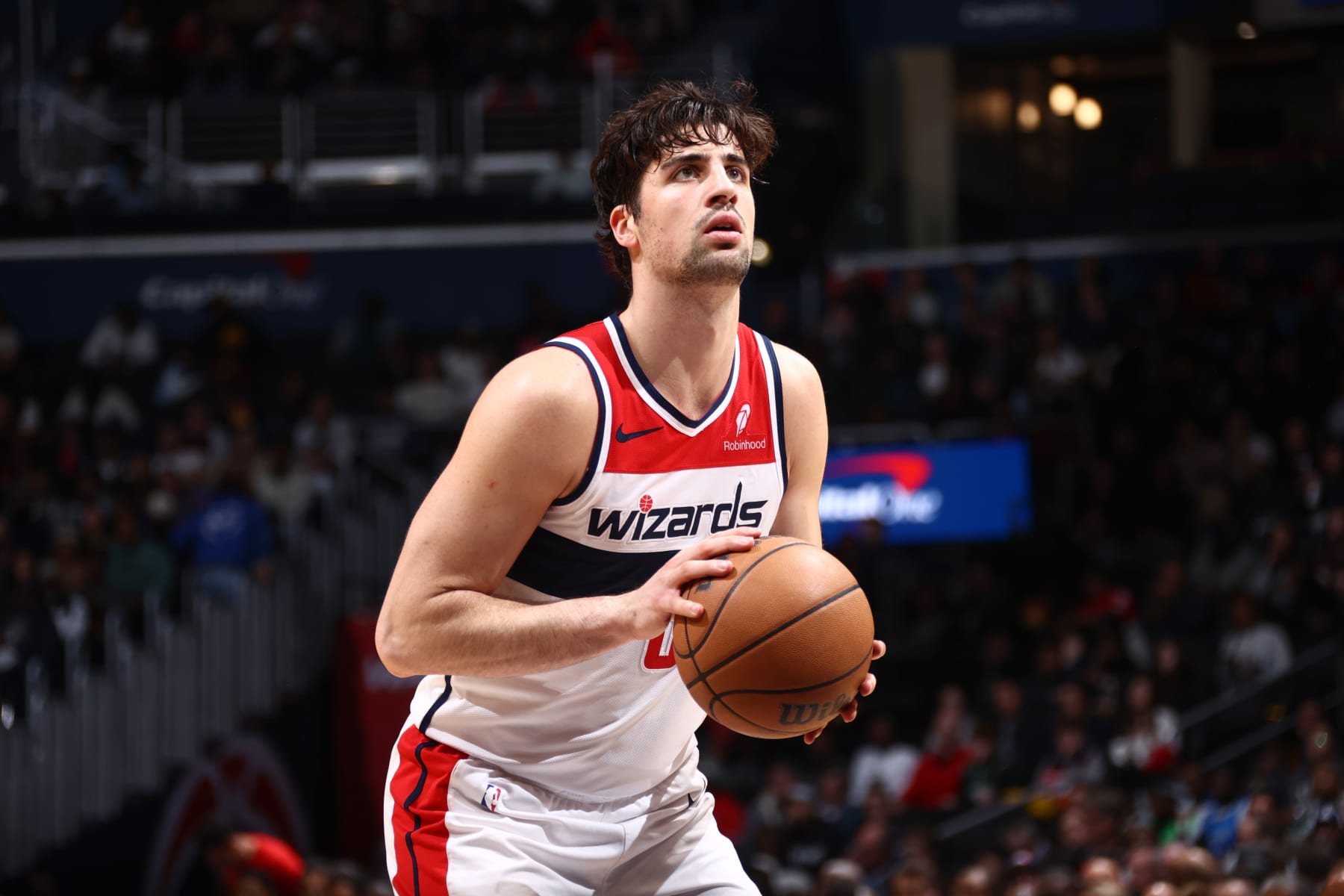WASHINGTON, DC -  APRIL 2:  Deni Avdija #8 of the Washington Wizards shoots a free throw during the game on April 2, 2024 at Capital One Arena in Washington, DC. NOTE TO USER: User expressly acknowledges and agrees that, by downloading and or using this Photograph, user is consenting to the terms and conditions of the Getty Images License Agreement. Mandatory Copyright Notice: Copyright 2024 NBAE (Photo by Kenny Giarla/NBAE via Getty Images)