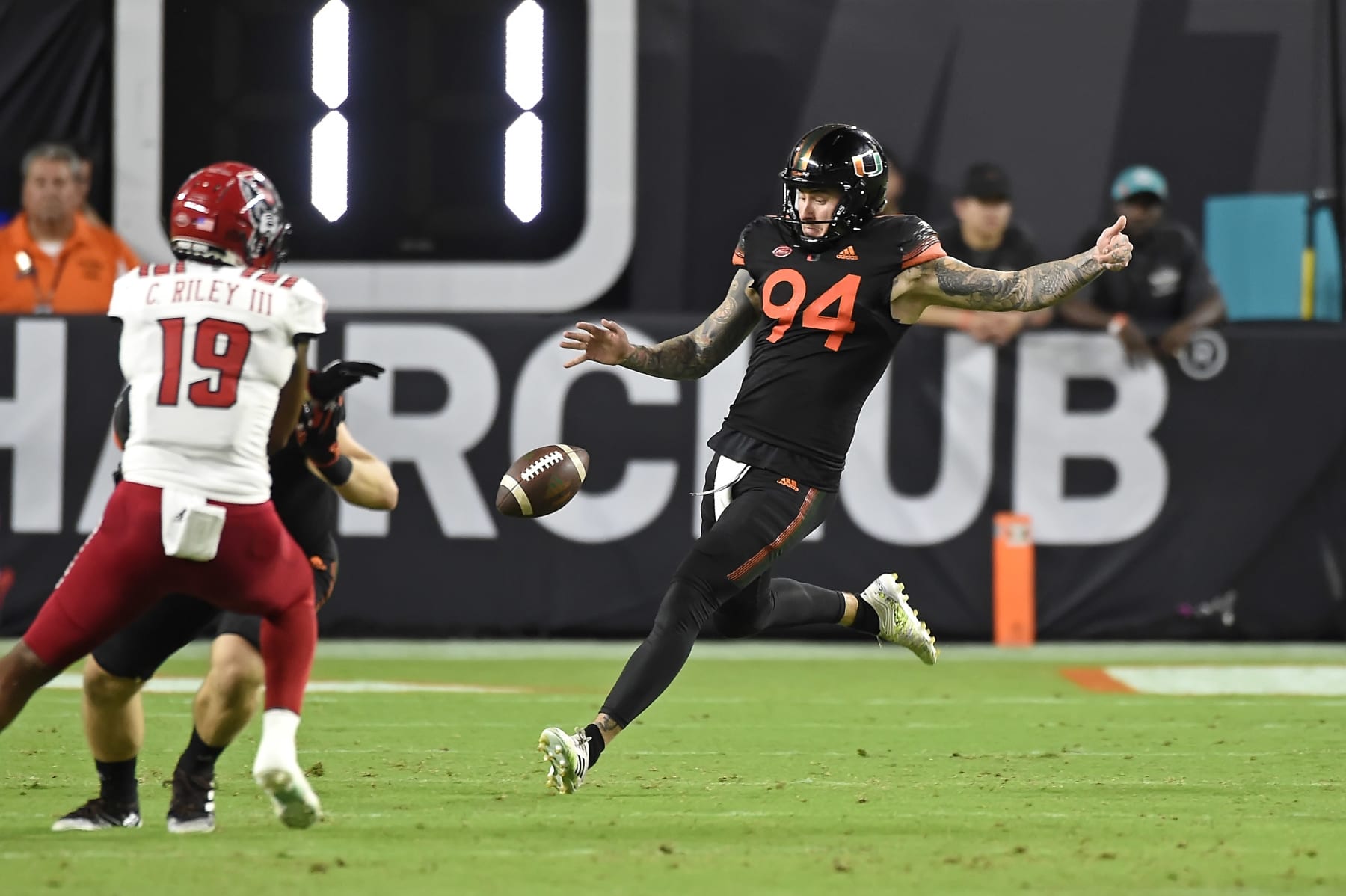 MIAMI GARDENS, FL - OCTOBER 23:  Miami punter Lou Hedley (94) punts in the second quarter as the University of Miami Hurricanes faced the North Carolina State University Wolfpack on October 23, 2021, at Hard Rock Stadium in Miami Gardens, Florida. (Photo by Samuel Lewis/Icon Sportswire via Getty Images)