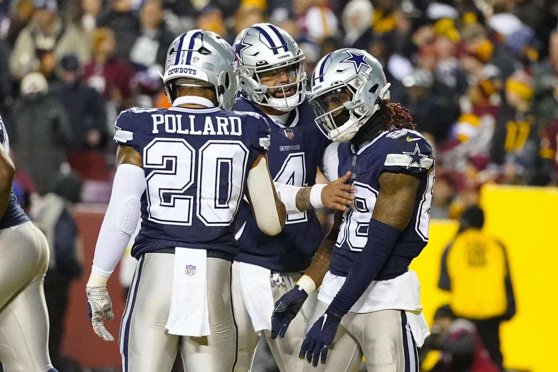 Tony Pollard, Dak Prescott and CeeDee Lamb