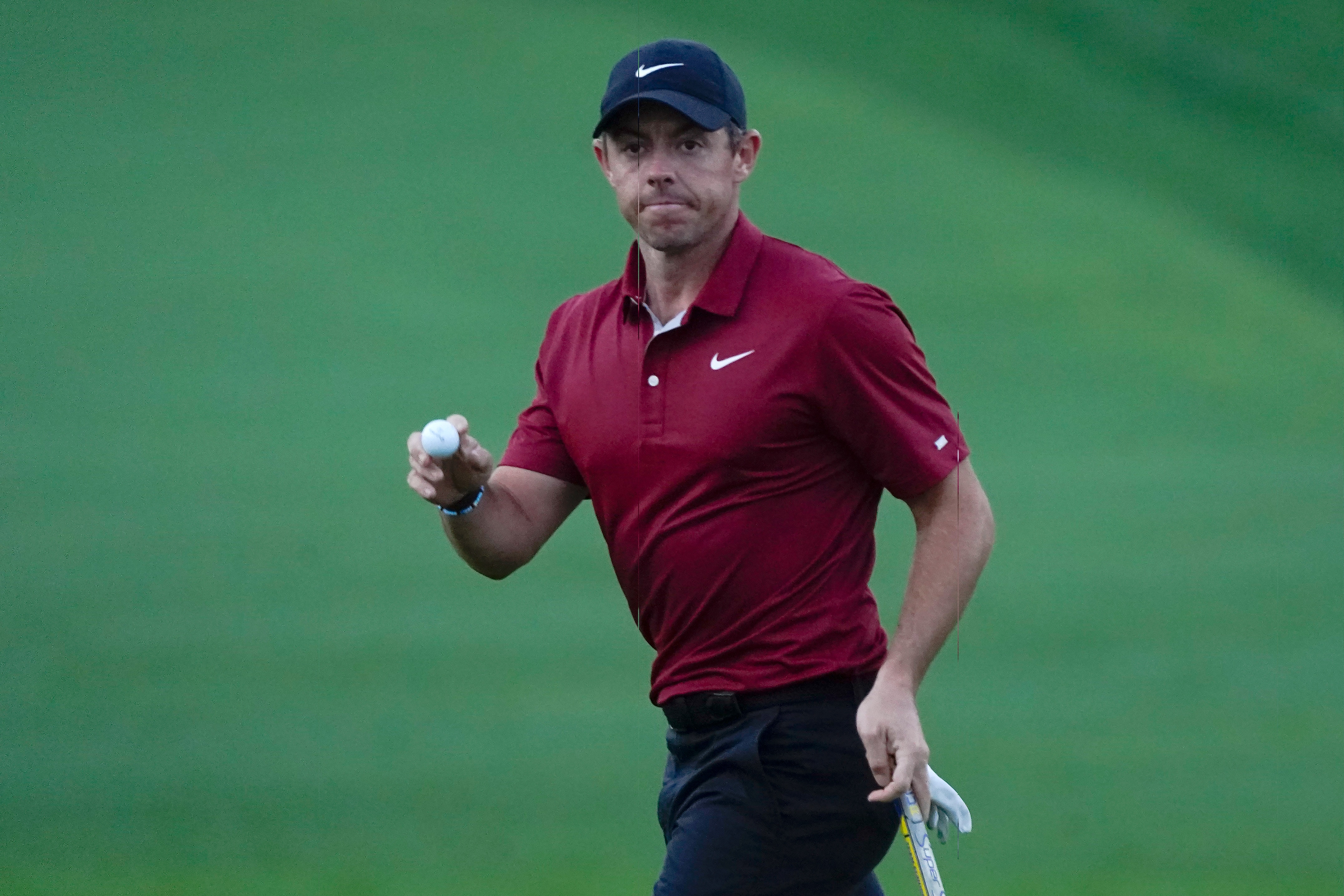 Rory McIlroy, of North Ireland, reacts after making a putt for birdie on the second hole during the first round of play in The Players Championship golf tournament Thursday, March 10, 2022, in Ponte Vedra Beach, Fla. (AP Photo/Lynne Sladky)