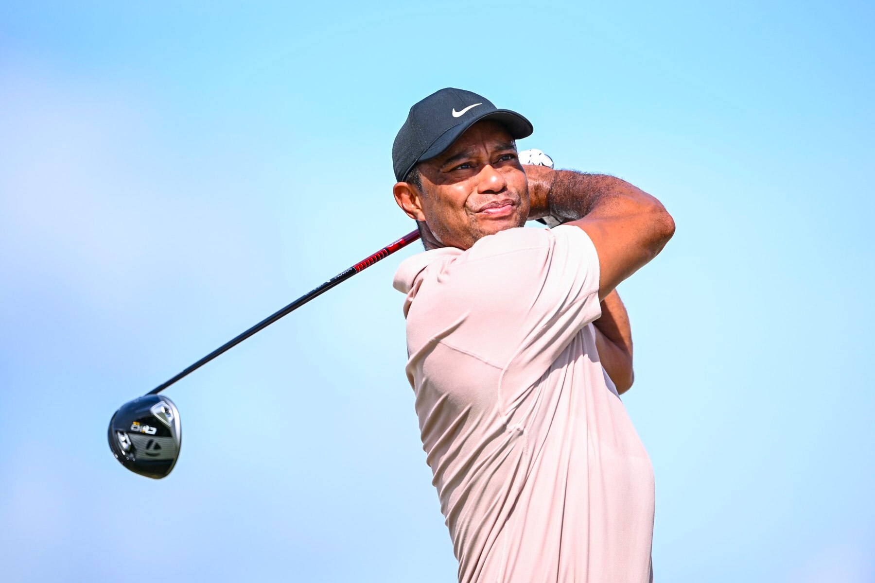 NASSAU, BAHAMAS - NOVEMBER 30:  Tiger Woods plays his shot from the fourth tee during the first round of the Hero World Challenge at Albany Golf Course on November 30, 2023 in Nassau, New Providence, Bahamas. (Photo by Tracy Wilcox/PGA TOUR via Getty Images)