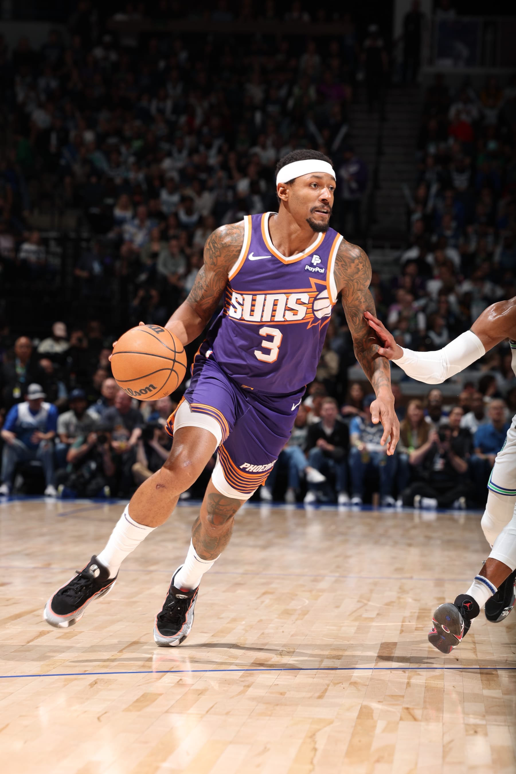 MINNEAPOLIS, MN -  APRIL 14: Bradley Beal #3 of the Phoenix Suns handles the ball during the game against the Minnesota Timberwolves on April 14, 2024 at Target Center in Minneapolis, Minnesota. NOTE TO USER: User expressly acknowledges and agrees that, by downloading and or using this Photograph, user is consenting to the terms and conditions of the Getty Images License Agreement. Mandatory Copyright Notice: Copyright 2024 NBAE (Photo by David Sherman/NBAE via Getty Images)
