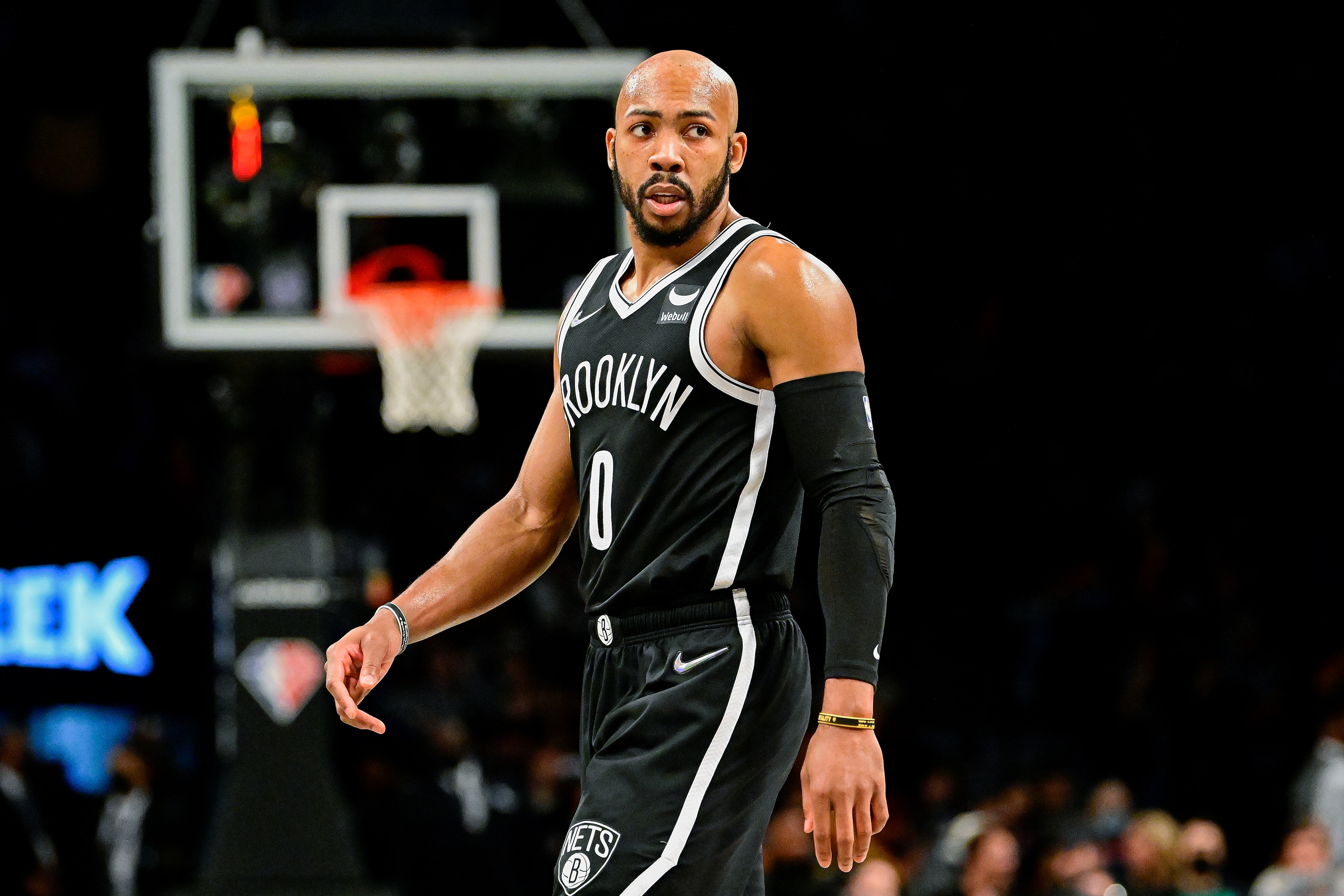 NEW YORK, NEW YORK - FEBRUARY 08:  Jevon Carter #0 of the Brooklyn Nets reacts during the game against the Boston Celtics at Barclays Center on February 08, 2022 in New York City. NOTE TO USER: User expressly acknowledges and agrees that, by downloading and or using this photograph, User is consenting to the terms and conditions of the Getty Images License Agreement. (Photo by Steven Ryan/Getty Images)