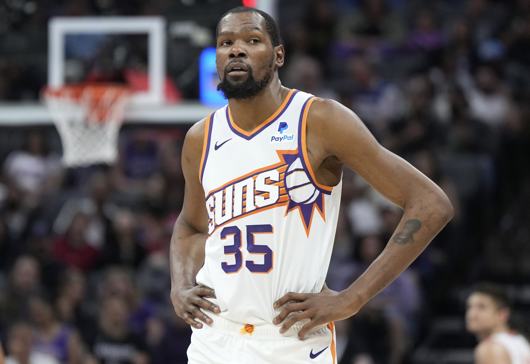 SACRAMENTO, CALIFORNIA - APRIL 12: Kevin Durant #35 of the Phoenix Suns looks on against the Sacramento Kings during the first half of an NBA basketball game at Golden 1 Center on April 12, 2024 in Sacramento, California. NOTE TO USER: User expressly acknowledges and agrees that, by downloading and or using this photograph, User is consenting to the terms and conditions of the Getty Images License Agreement. (Photo by Thearon W. Henderson/Getty Images)