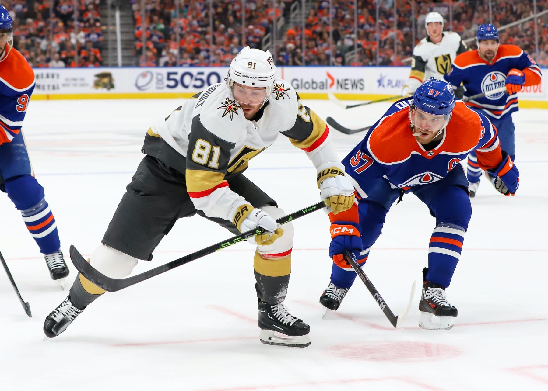 EDMONTON, CANADA - MAY 14: Jonathan Marchessault #81 of the Las Vegas Golden Knights battles for the puck with Connor McDavid #97 of the Edmonton Oilers in the first period in Game Six of the Second Round of the 2023 Stanley Cup Playoffs May 14, 2023 at Rogers Place in Edmonton, Alberta, Canada. (Photo by Lawrence Scott/Getty Images)