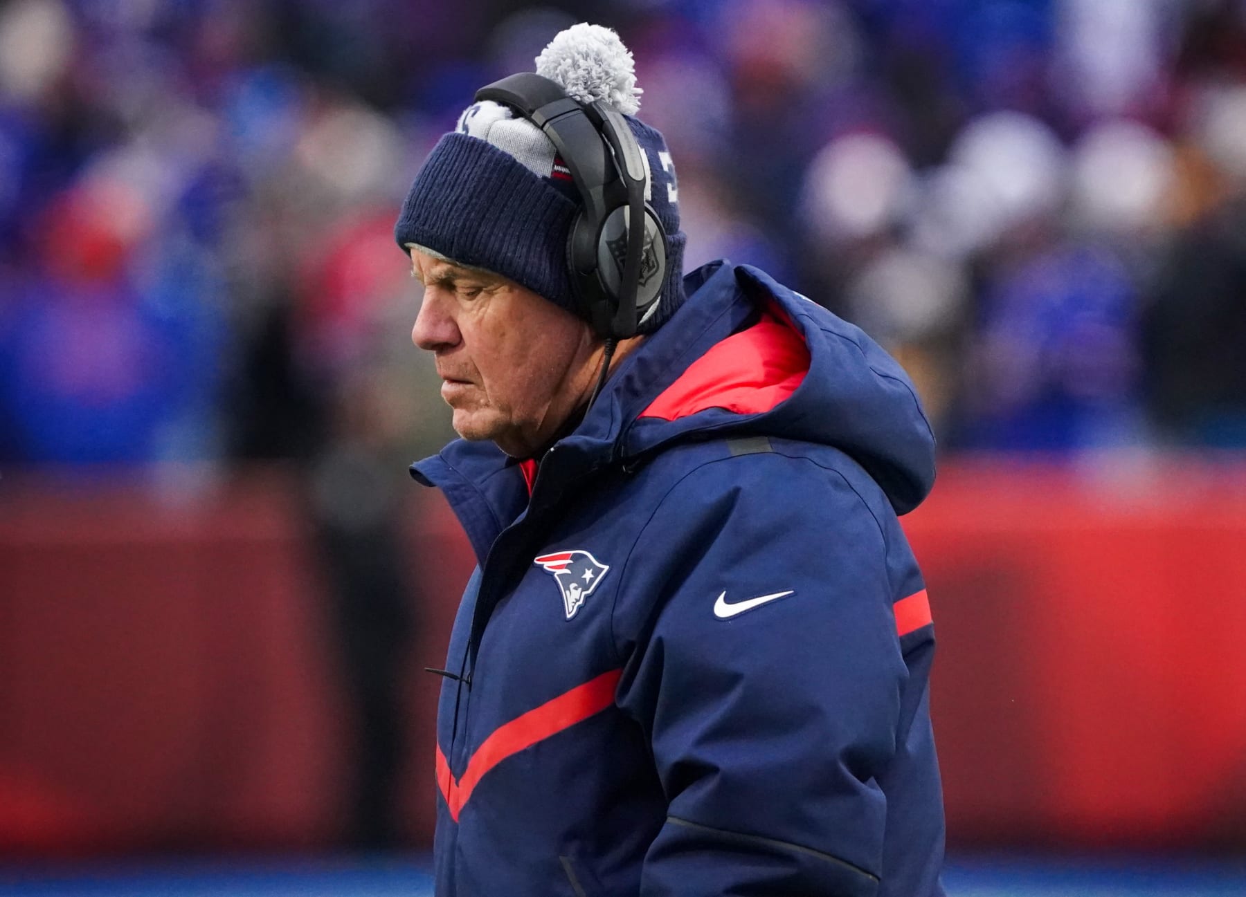 Orchard Park, NY - January 8: New England Patriots head coach Bill Belichick casts his gaze downwards during the third quarter. The Patriots lost to the Buffalo Bills, 35-23. (Photo by Barry Chin/The Boston Globe via Getty Images)