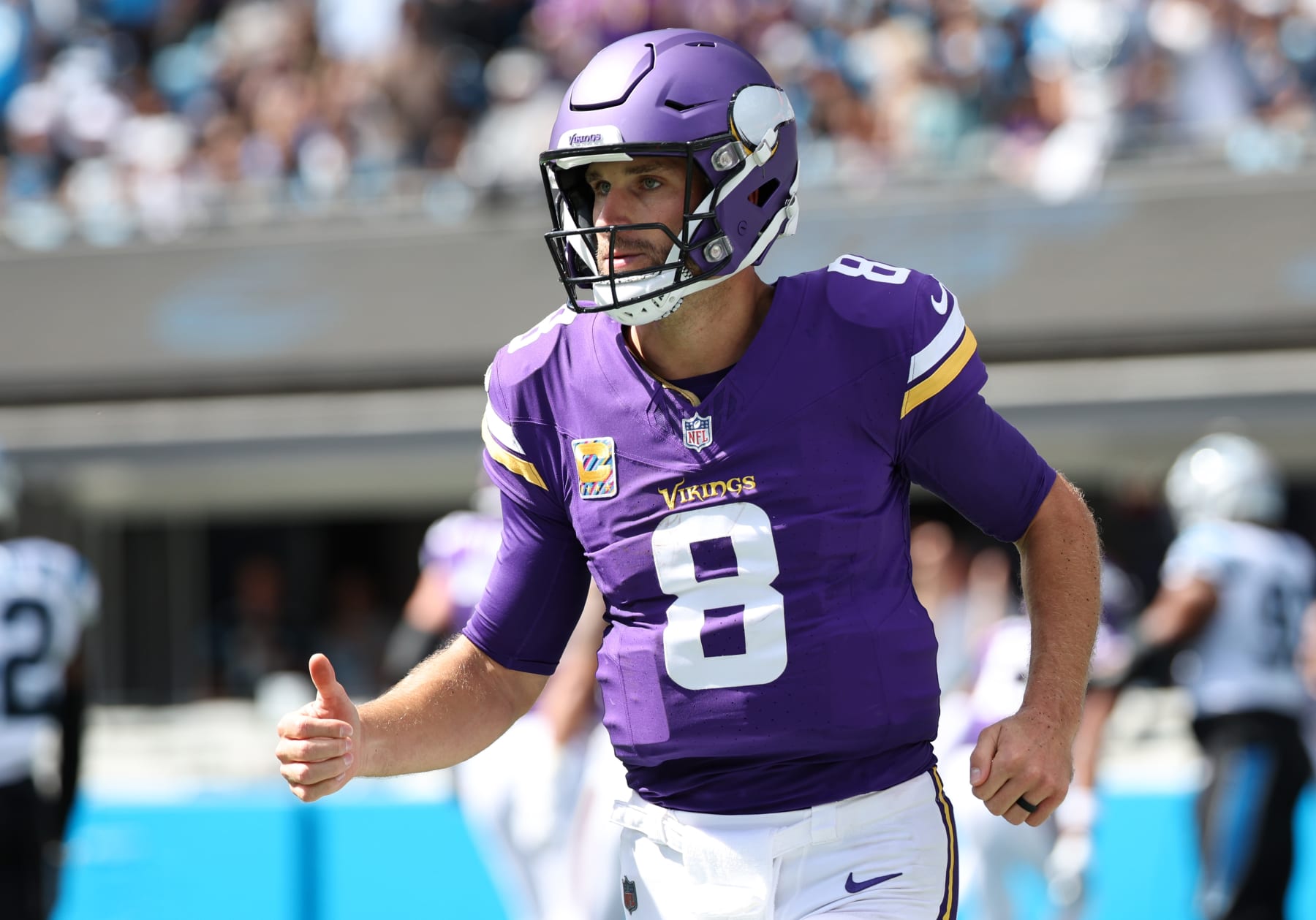 CHARLOTTE, NORTH CAROLINA - OCTOBER 01: Kirk Cousins #8 of the Minnesota Vikings celebrates after a touchdown pass against the Carolina Panthers during the second quarter at Bank of America Stadium on October 01, 2023 in Charlotte, North Carolina. (Photo by Jared C. Tilton/Getty Images)