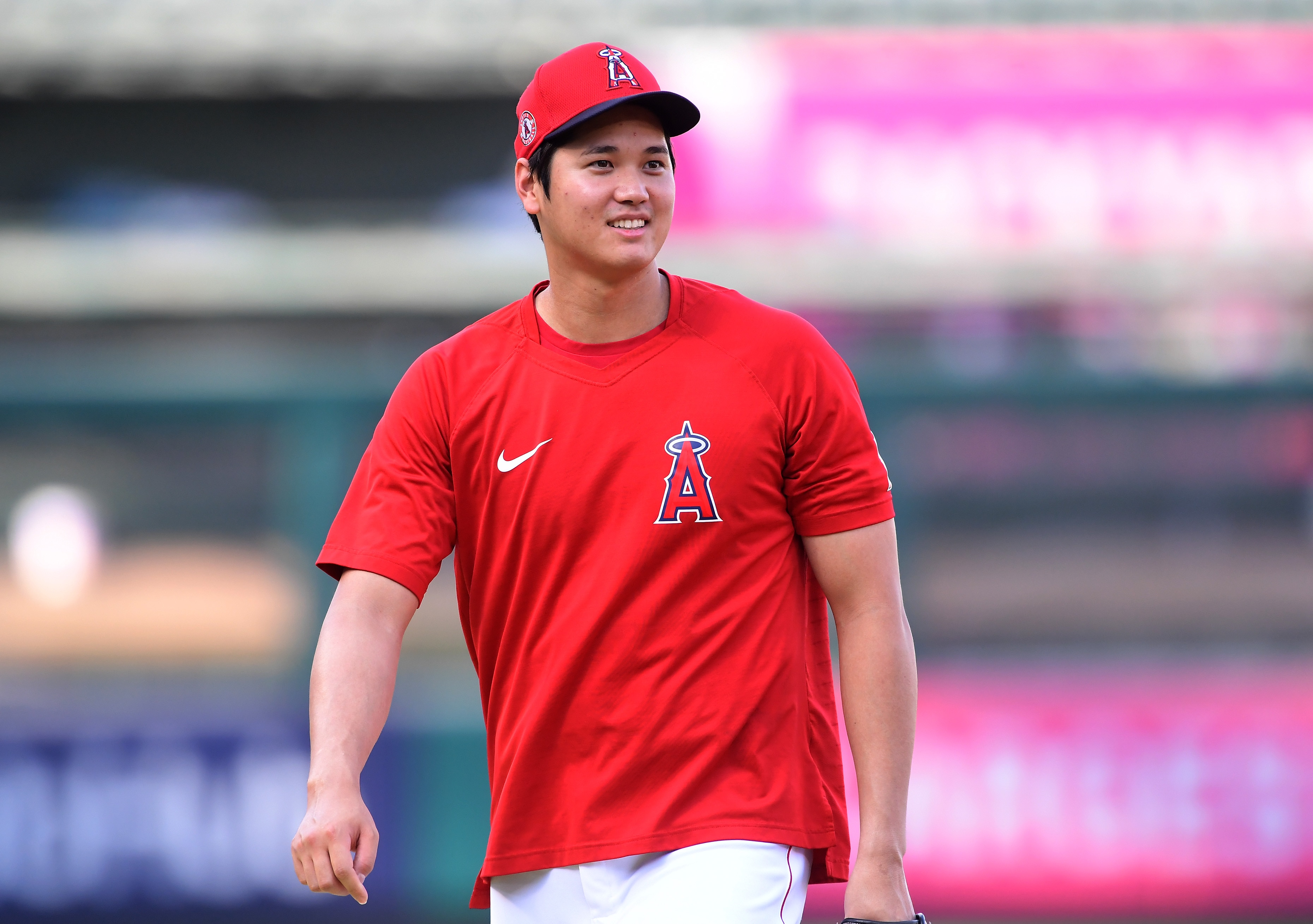 ANAHEIM, CA - AUGUST 31: Shohei Ohtani #17 of the Los Angeles Angels smiles as he warms up before the game against the New York Yankees at Angel Stadium of Anaheim on August 31, 2021 in Anaheim, California. (Photo by Jayne Kamin-Oncea/Getty Images)