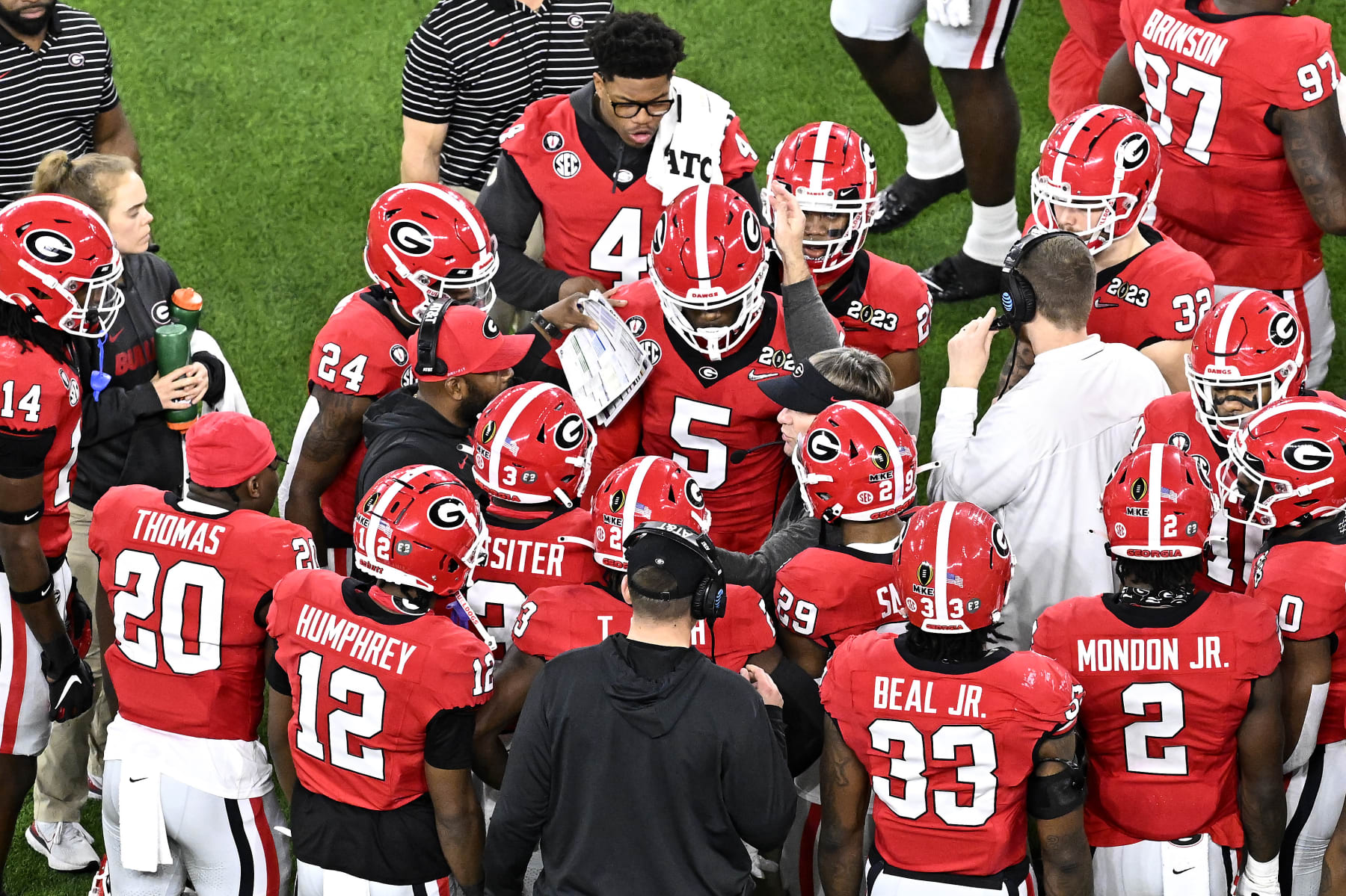 INGLEWOOD, CALIFORNIA - JANUARY 09: Head coach Kirby Smart of the Georgia Bulldogs talks with Kelee Ringo #5 of the Georgia Bulldogs on the sideline during the first half against the TCU Horned Frogs in the College Football Playoff National Championship game at SoFi Stadium on January 09, 2023 in Inglewood, California. (Photo by Kevork Djansezian/Getty Images)