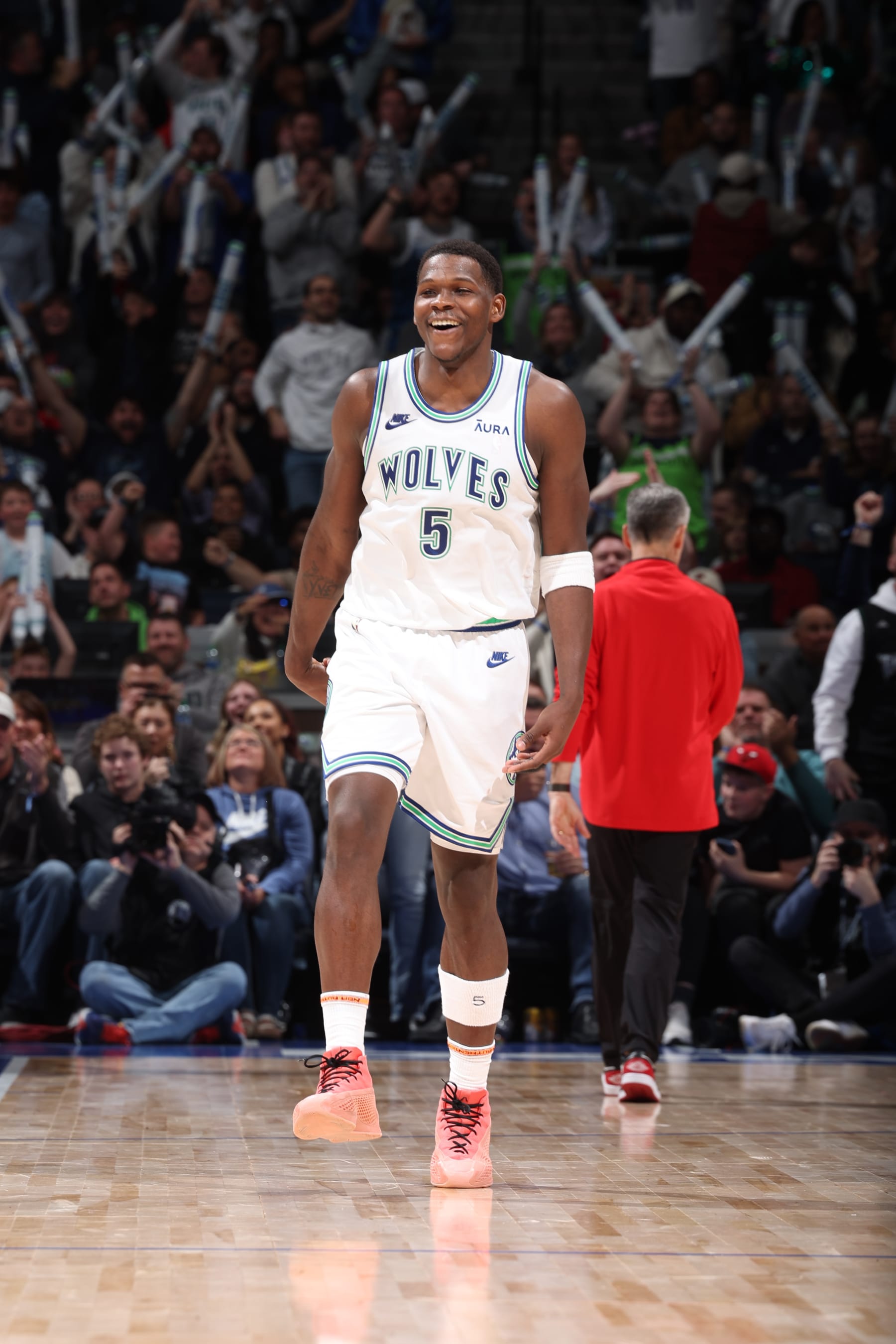 MINNEAPOLIS, MN -  MARCH 31: Anthony Edwards #5 of the Minnesota Timberwolves smiles during the game against the Chicago Bulls on March 31, 2024 at Target Center in Minneapolis, Minnesota. NOTE TO USER: User expressly acknowledges and agrees that, by downloading and or using this Photograph, user is consenting to the terms and conditions of the Getty Images License Agreement. Mandatory Copyright Notice: Copyright 2024 NBAE (Photo by David Sherman/NBAE via Getty Images)