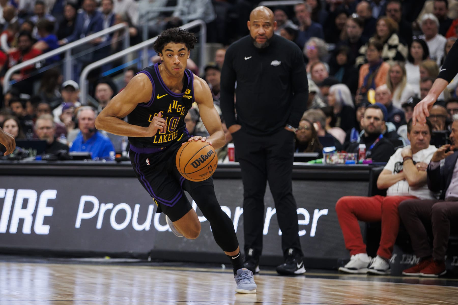 TORONTO, CANADA - APRIL 2: Max Christie #10 of the Los Angeles Lakers dribbles against the Toronto Raptors during the first half of their NBA game at Scotiabank Arena on April 2, 2024 in Toronto, Canada. NOTE TO USER: User expressly acknowledges and agrees that, by downloading and or using this photograph, User is consenting to the terms and conditions of the Getty Images License Agreement. (Photo by Cole Burston/Getty Images)