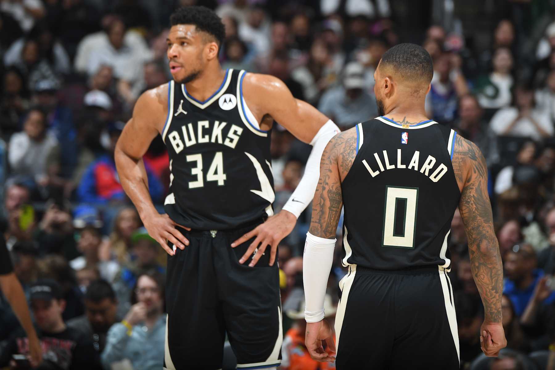 LOS ANGELES, CA - MARCH 10: Giannis Antetokounmpo #34 of the Milwaukee Bucks and Damian Lillard #0 of the Milwaukee Bucks look on during the game against the LA Clippers on March 10, 2024 at Crypto.Com Arena in Los Angeles, California. NOTE TO USER: User expressly acknowledges and agrees that, by downloading and/or using this Photograph, user is consenting to the terms and conditions of the Getty Images License Agreement. Mandatory Copyright Notice: Copyright 2024 NBAE (Photo by Andrew D. Bernstein/NBAE via Getty Images)