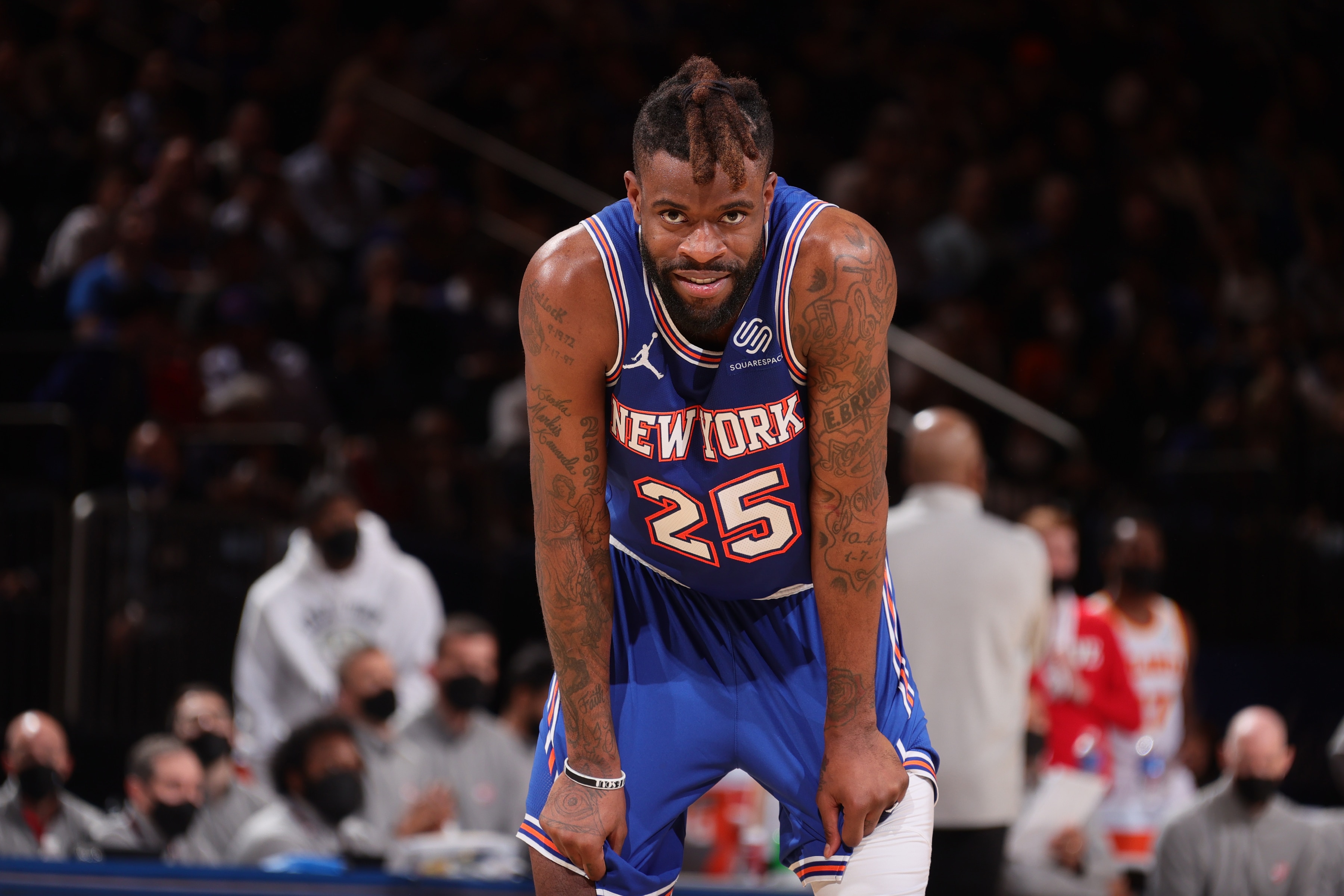 NEW YORK, NY - JUNE 2: Reggie Bullock #25 of the New York Knicks looks on during Round 1, Game 5 of the 2021 NBA Playoffs on June 2, 2021 at Madison Square Garden in New York City, New York.  NOTE TO USER: User expressly acknowledges and agrees that, by downloading and or using this photograph, User is consenting to the terms and conditions of the Getty Images License Agreement. Mandatory Copyright Notice: Copyright 2021 NBAE  (Photo by Nathaniel S. Butler/NBAE via Getty Images)