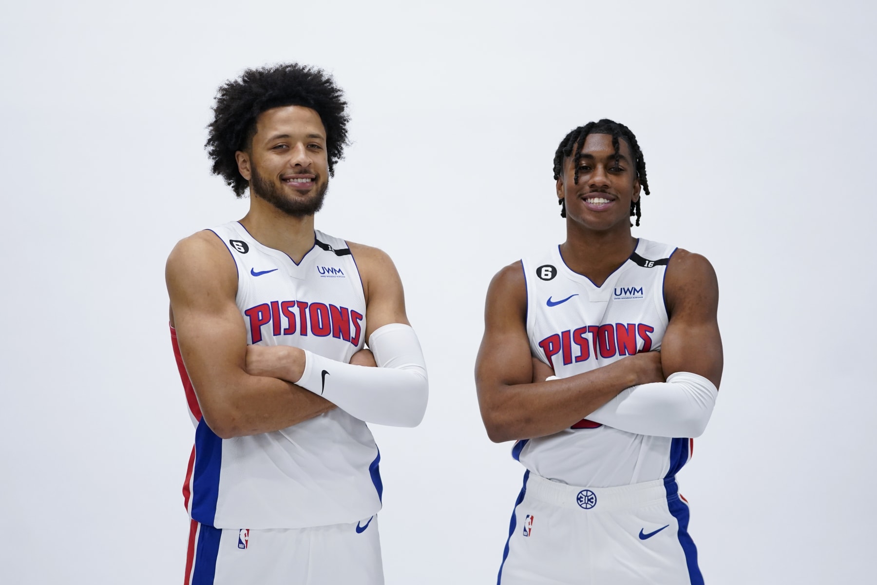 Detroit Pistons guard Cade Cunningham, left, and Jaden Ivey pose during the NBA basketball team's media day in Detroit, Monday, Sept. 26, 2022. (AP Photo/Paul Sancya)