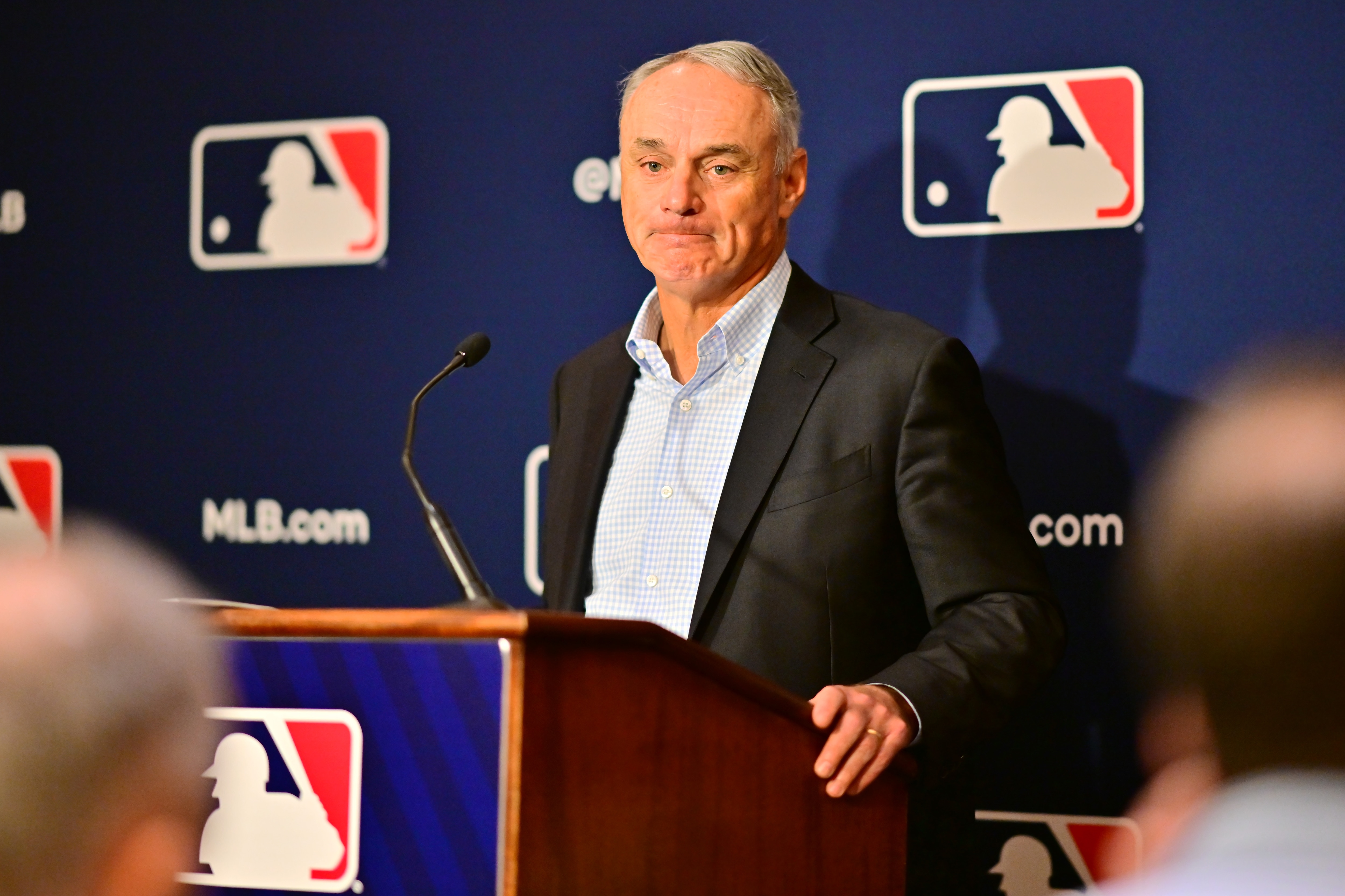 ORLANDO, FLORIDA - FEBRUARY 10: Major League Baseball Commissioner Rob Manfred answers questions during an MLB owner's meeting at the Waldorf Astoria on February 10, 2022 in Orlando, Florida. Manfred addressed the ongoing lockout of players, which owners put in place after the league's collective bargaining agreement ended on December 1, 2021. (Photo by Julio Aguilar/Getty Images) ORLANDO, FLORIDA - FEBRUARY 10: Major League Baseball Commissioner Rob Manfred answers questions during an MLB owner's meeting at the Waldorf Astoria on February 10, 2022 in Orlando, Florida. Manfred addressed the ongoing lockout of players, which owners put in place after the league's collective bargaining agreement ended on December 1, 2021. (Photo by Julio Aguilar/Getty Images)