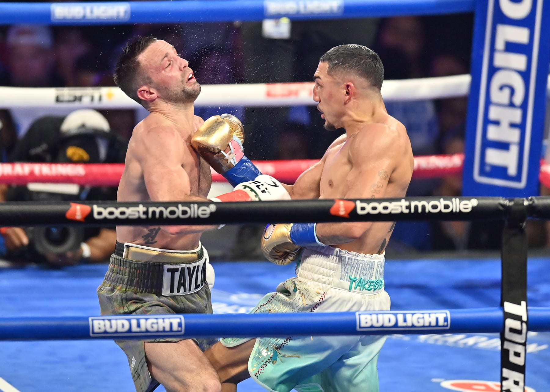NEW YORK, NY - JUNE 10: Josh Taylor (red tape) takes on Teofimo Lopez (blue tape) in a jr. welterweight bout for Top Rank Boxing on June 10, 2023 at The Theater at Madison Square Garden in New York, NY. (Photo by Williams Paul/Icon Sportswire via Getty Images)