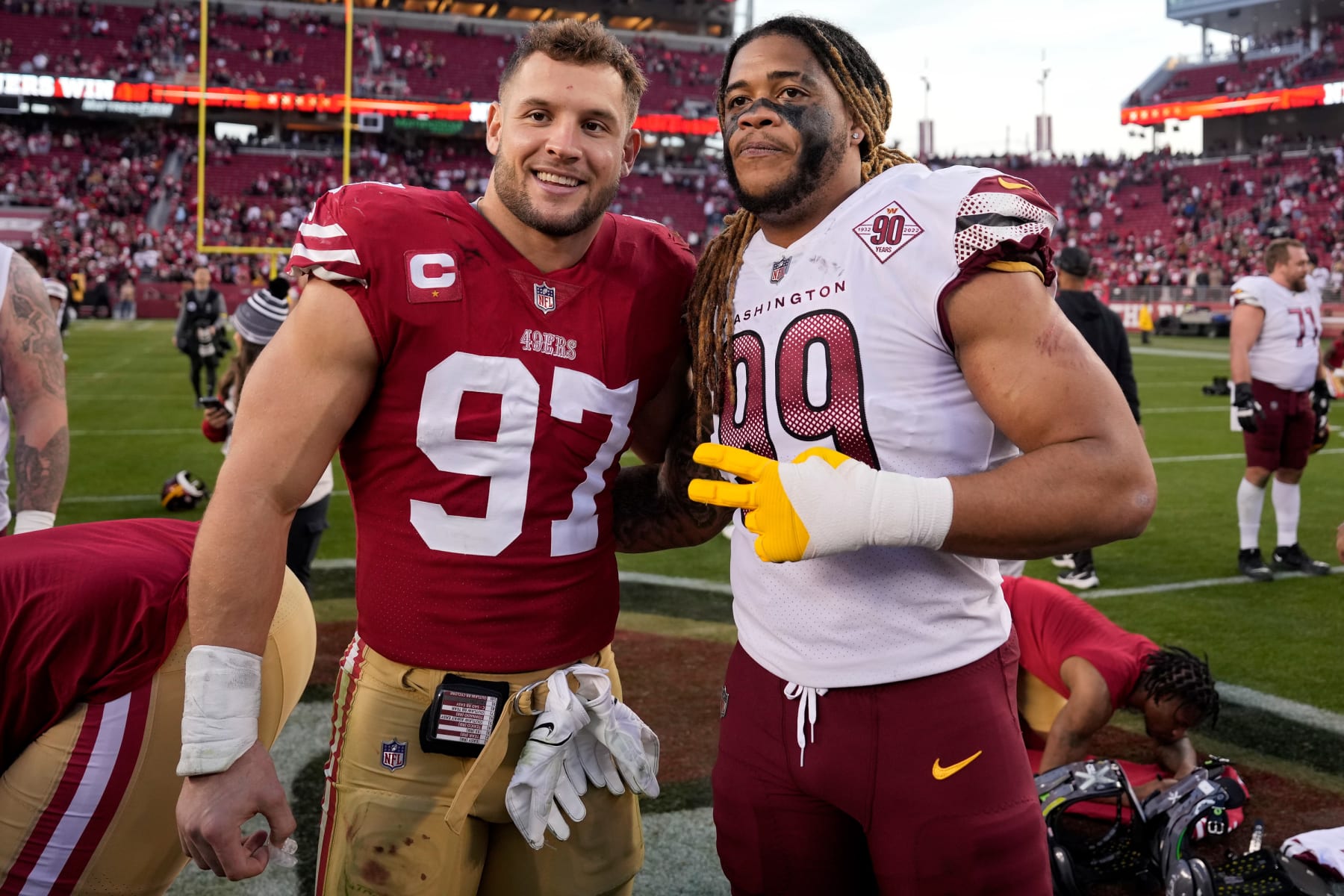 SANTA CLARA, CALIFORNIA - DECEMBER 24: Chase Young #99 of the Washington Commanders pose with Nick Bosa #97 of the San Francisco 49ers after the game at Levi's Stadium on December 24, 2022 in Santa Clara, California. (Photo by Thearon W. Henderson/Getty Images)