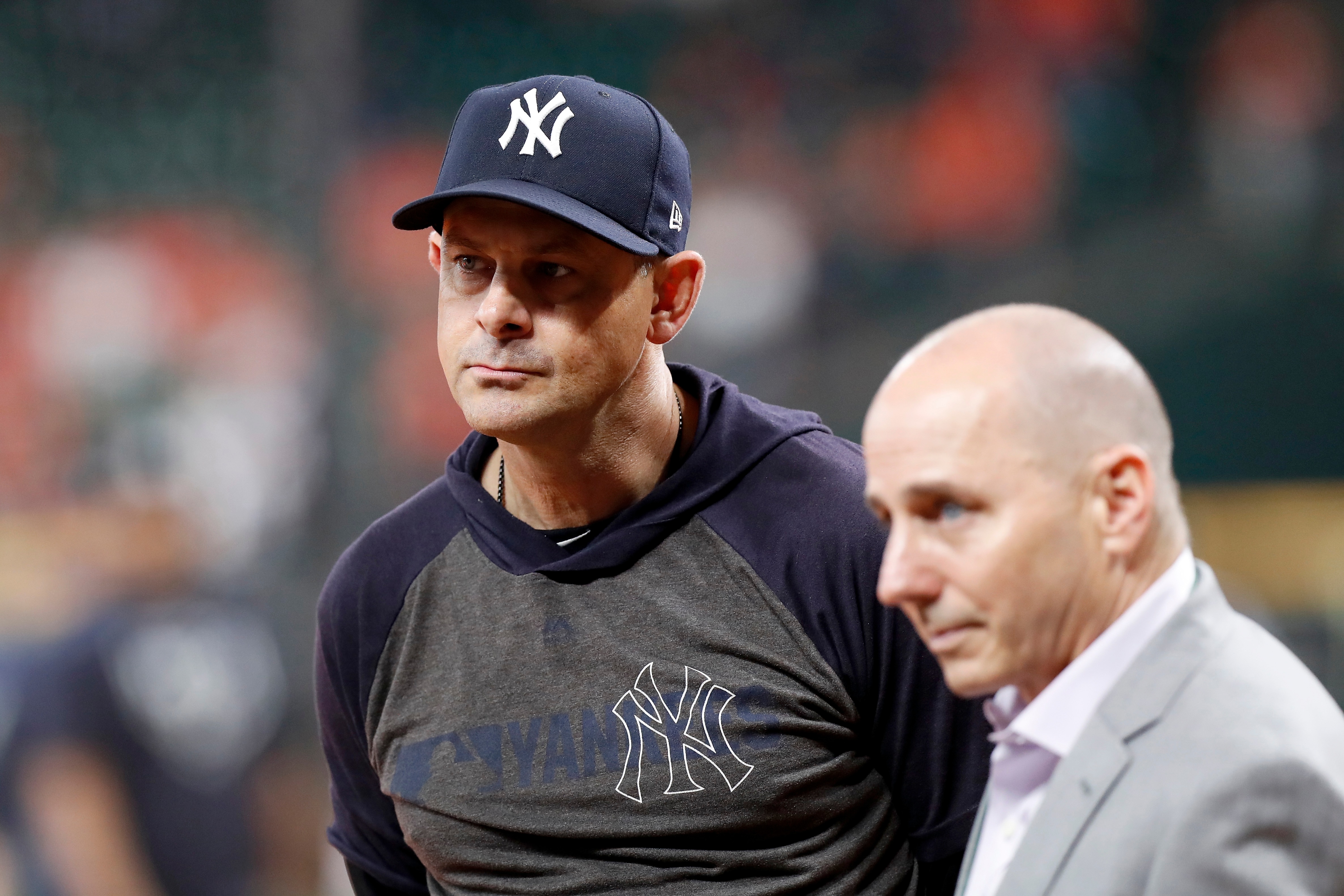 HOUSTON, TX - OCTOBER 13:  Manager Aaron Boone #17 of the New York Yankees watches batting practice before game two of the American League Championship Series against the Houston Astros at Minute Maid Park on October 13, 2019 in Houston, Texas.  (Photo by Tim Warner/Getty Images)
