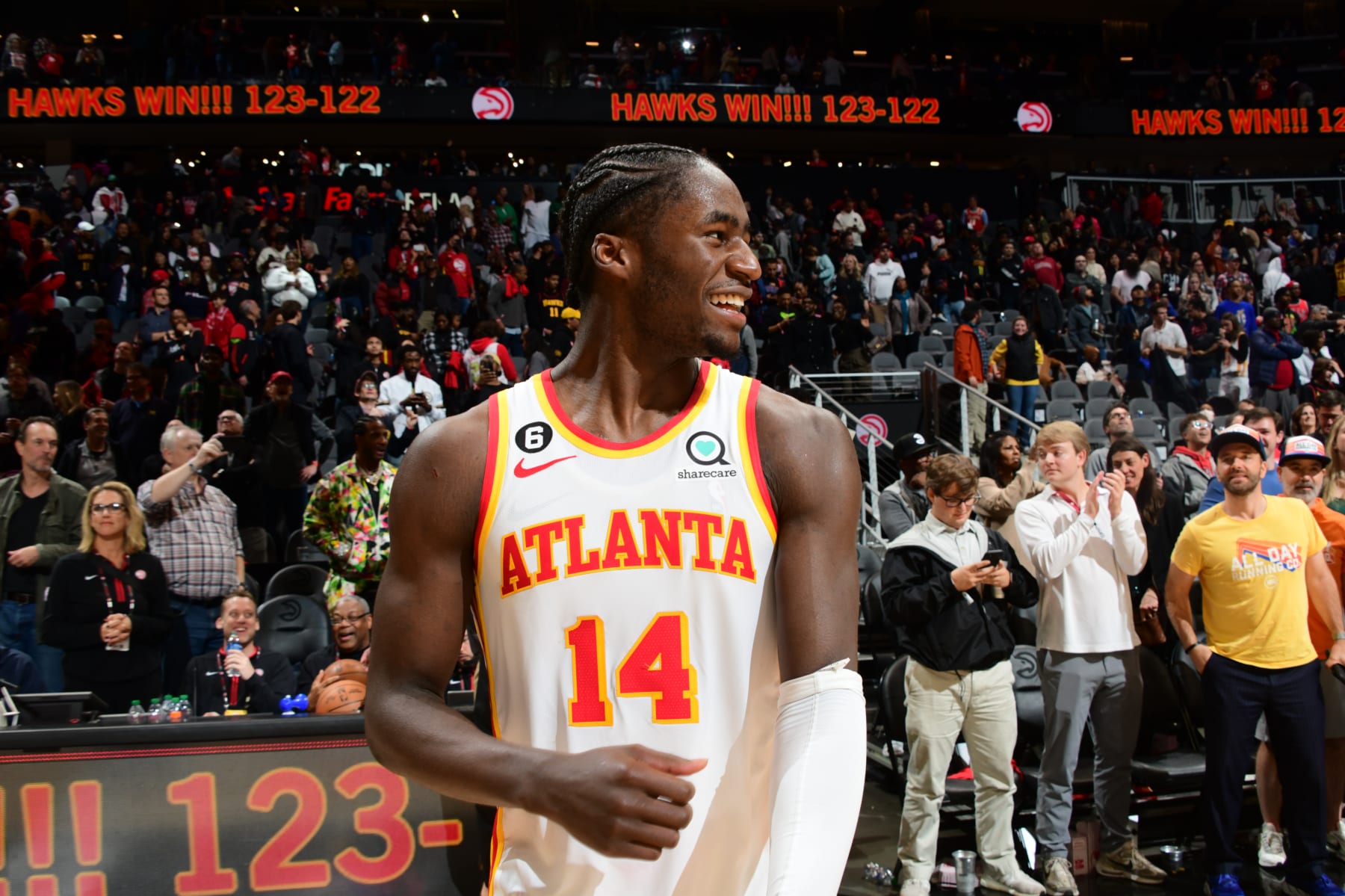 ATLANTA, GA - DECEMBER 11: AJ Griffin #14 of the Atlanta Hawks smiles postgame after shooting the game winner with 0.5 seconds remaining in overtime against the Chicago Bulls on December 11, 2022 at State Farm Arena in Atlanta, Georgia.  NOTE TO USER: User expressly acknowledges and agrees that, by downloading and/or using this Photograph, user is consenting to the terms and conditions of the Getty Images License Agreement. Mandatory Copyright Notice: Copyright 2022 NBAE (Photo by Scott Cunningham/NBAE via Getty Images)