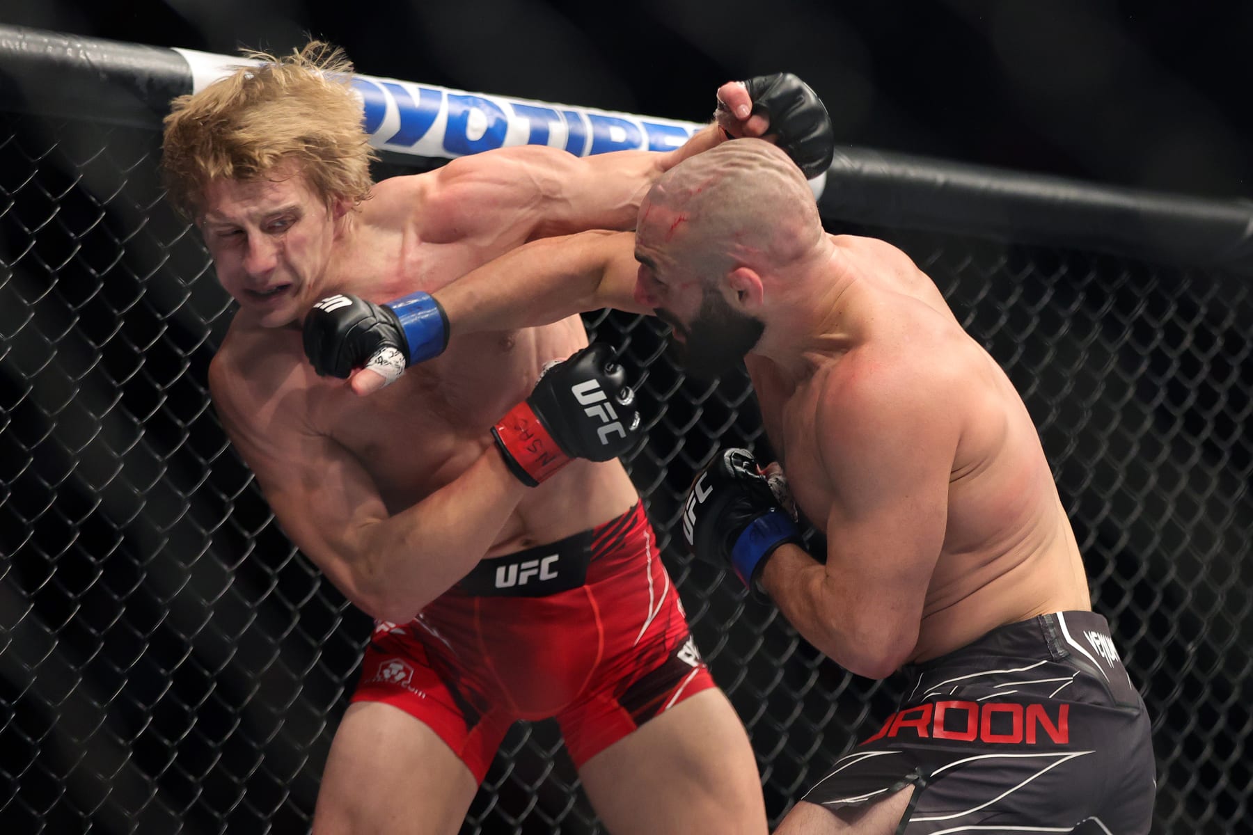 LAS VEGAS, NEVADA - DECEMBER 10: (R-L) Jared Gordon punches Paddy Pimblett of England in a lightweight fight during the UFC 282 event at T-Mobile Arena on December 10, 2022 in Las Vegas, Nevada. (Photo by Carmen Mandato/Zuffa LLC)