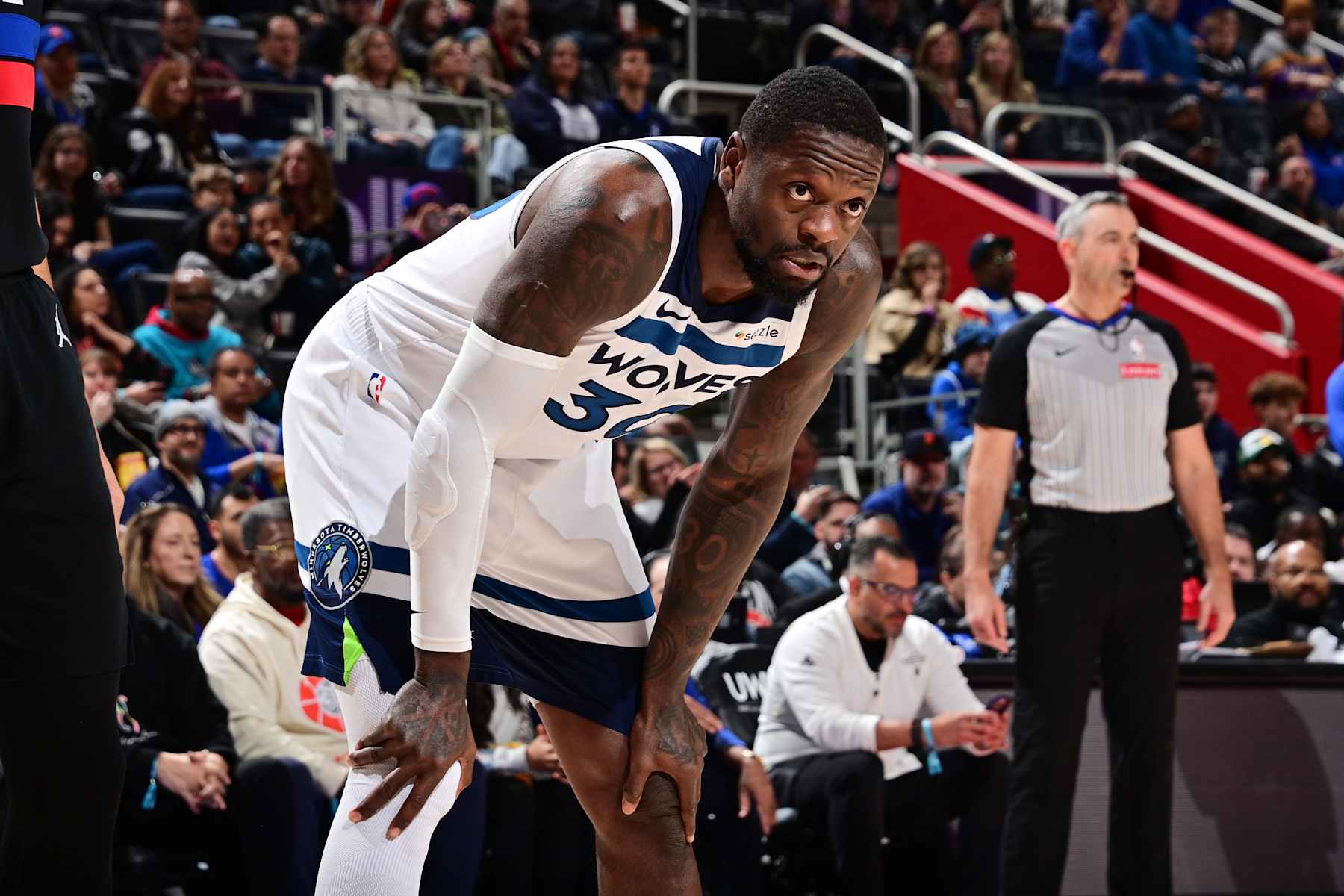 DETROIT, MI - JANUARY 4: Julius Randle #30 of the Minnesota Timberwolves looks on during the game against the Detroit Pistons on January 4, 2025 at Little Caesars Arena in Detroit, Michigan. NOTE TO USER: User expressly acknowledges and agrees that, by downloading and/or using this photograph, User is consenting to the terms and conditions of the Getty Images License Agreement. Mandatory Copyright Notice: Copyright 2025 NBAE (Photo by Chris Schwegler/NBAE via Getty Images)