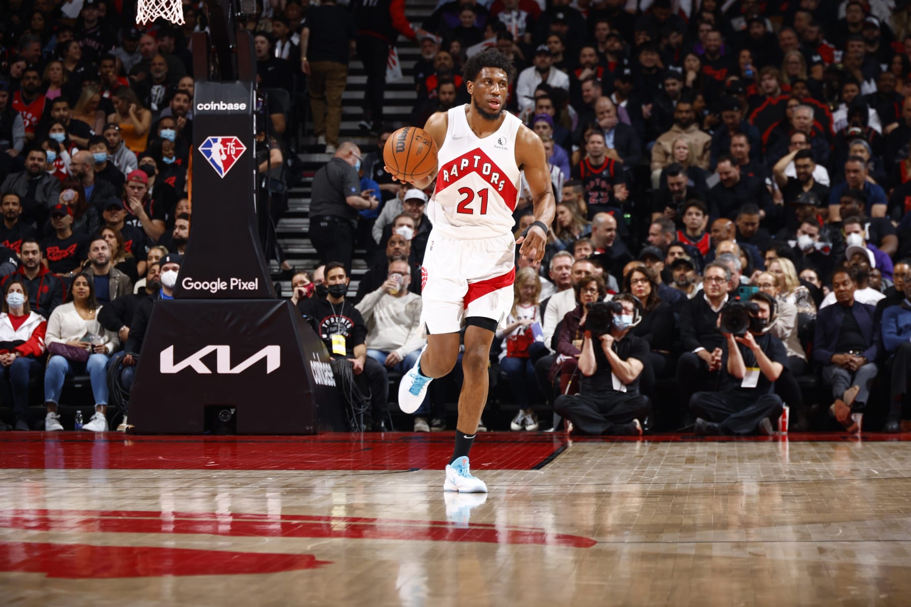 TORONTO, CANADA - APRIL 28: Thaddeus Young #21 of the Toronto Raptors dribbles the ball during the game against the Philadelphia 76ers during Round 1 Game 6 of the 2022 NBA Playoffs on April 28, 2022 at the Scotiabank Arena in Toronto, Ontario, Canada.  NOTE TO USER: User expressly acknowledges and agrees that, by downloading and or using this Photograph, user is consenting to the terms and conditions of the Getty Images License Agreement.  Mandatory Copyright Notice: Copyright 2022 NBAE (Photo by Vaughn Ridley/NBAE via Getty Images)