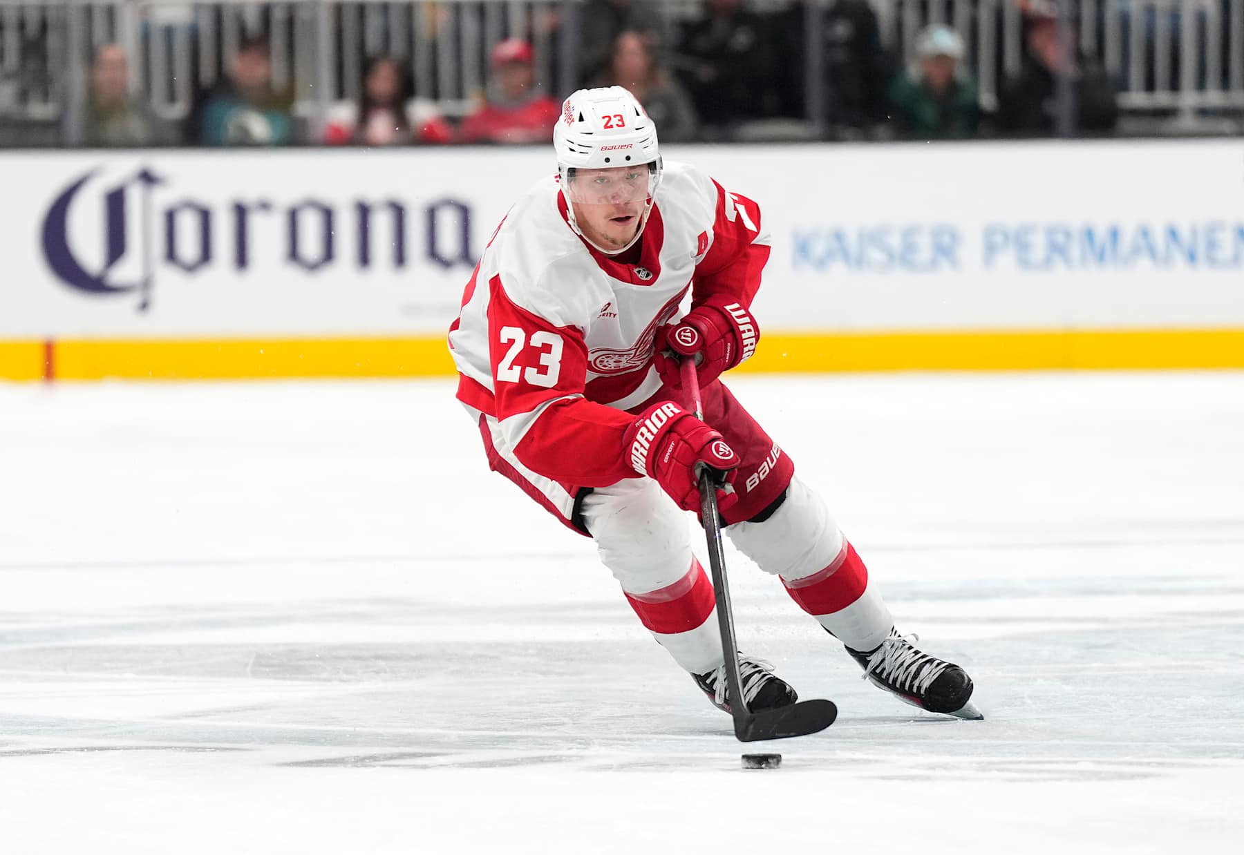 SAN JOSE, CALIFORNIA - NOVEMBER 18: Lucas Raymond #23 of the Detroit Red Wings skates with the puck against the San Jose Sharks during the first period of an NHL hockey game at SAP Center on November 18, 2024 in San Jose, California. (Photo by Thearon W. Henderson/Getty Images)