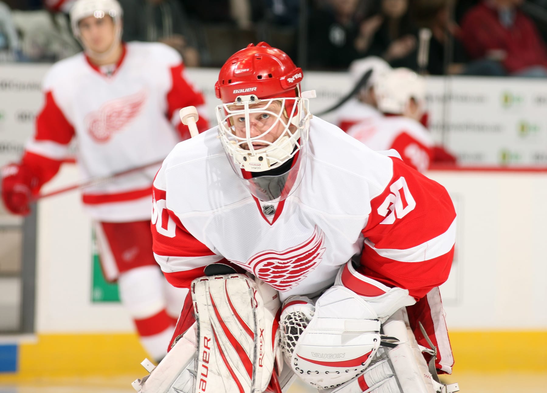 DENVER, CO - DECEMBER 27:  Goaltender Chris Osgood #30 of the Detroit Red Wings makes a save against the Colorado Avalanche at the Pepsi Center on December 27, 2010 in Denver, Colorado. The Red Wings went on to win 4-3 in overtime as goaltender Chris Osgood claimed his 400th career win.  (Photo by Michael Martin/NHLI via Getty Images)