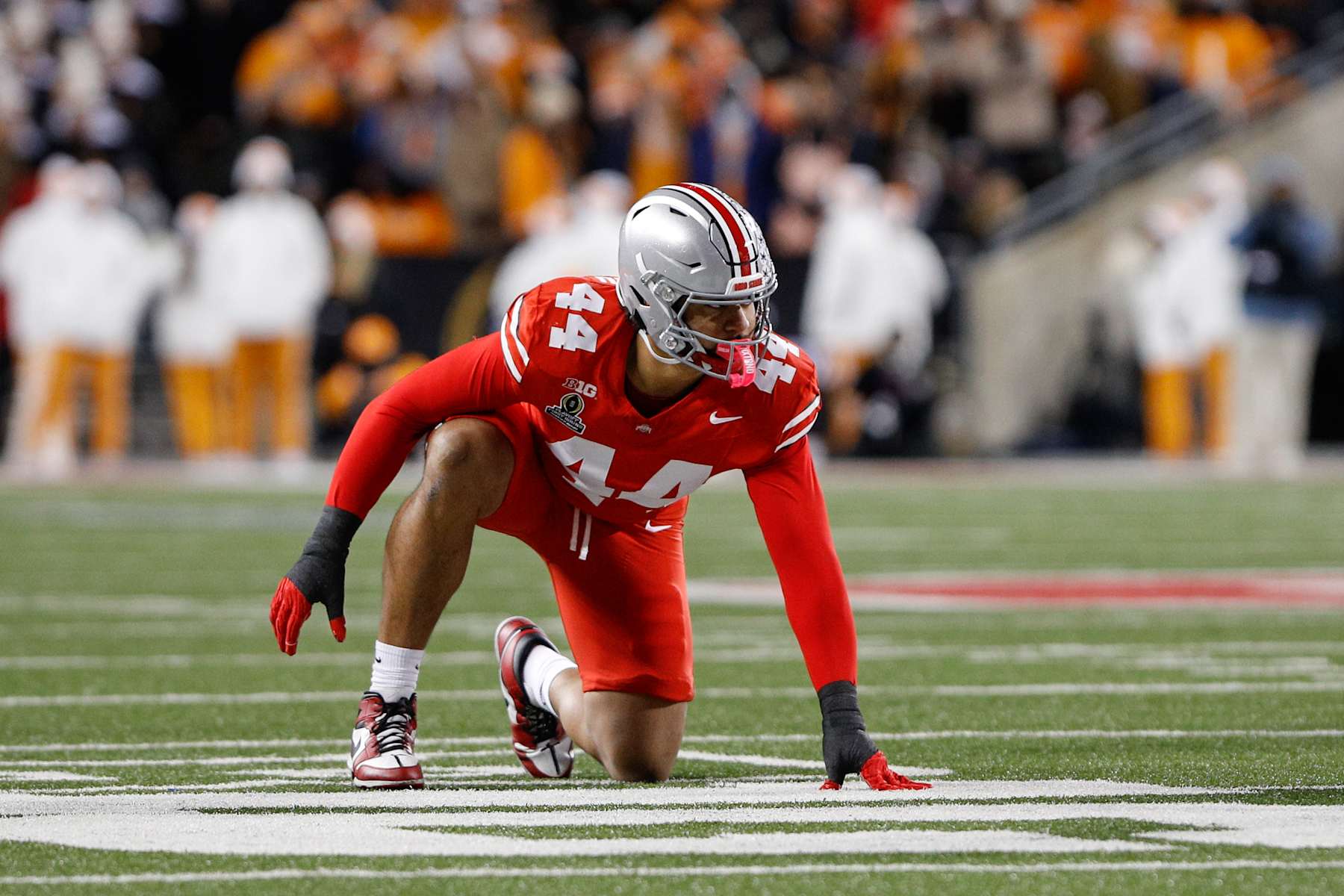 COLUMBUS, OH - DECEMBER 21: Ohio State Buckeyes defensive end JT Tuimoloau (44) lines up for a play during the college football playoff first round game against the Tennessee Volunteers and the Ohio State Buckeyes on December 21, 2024, at Ohio Stadium in Columbus, OH. (Photo by Ian Johnson/Icon Sportswire via Getty Images)