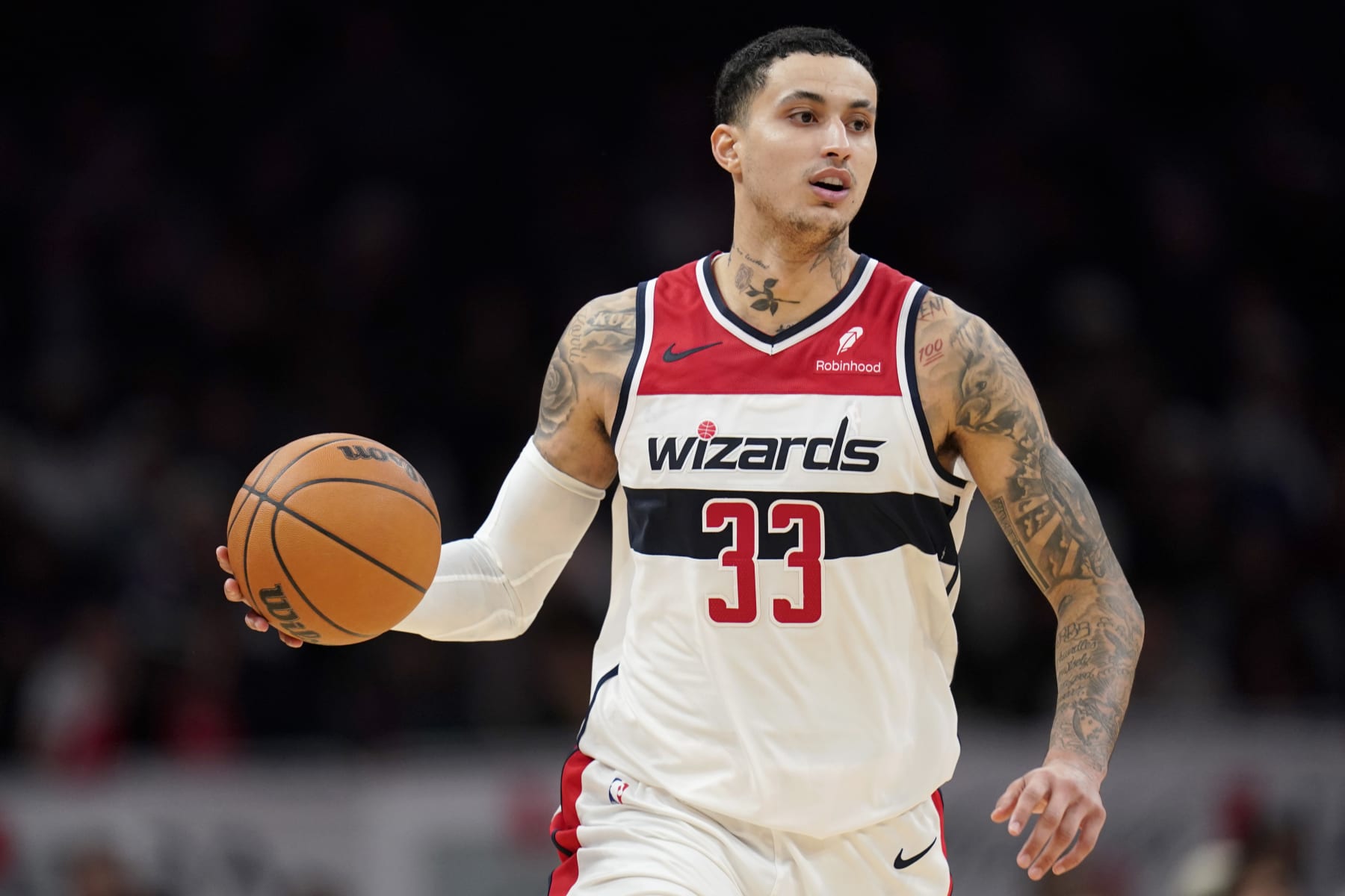 WASHINGTON, DC - JANUARY 24: Kyle Kuzma #33 of the Washington Wizards dribbles the ball during the second half against the Minnesota Timberwolves at Capital One Arena on January 24, 2024 in Washington, DC. NOTE TO USER: User expressly acknowledges and agrees that, by downloading and or using this photograph, User is consenting to the terms and conditions of the Getty Images License Agreement. (Photo by Jess Rapfogel/Getty Images)