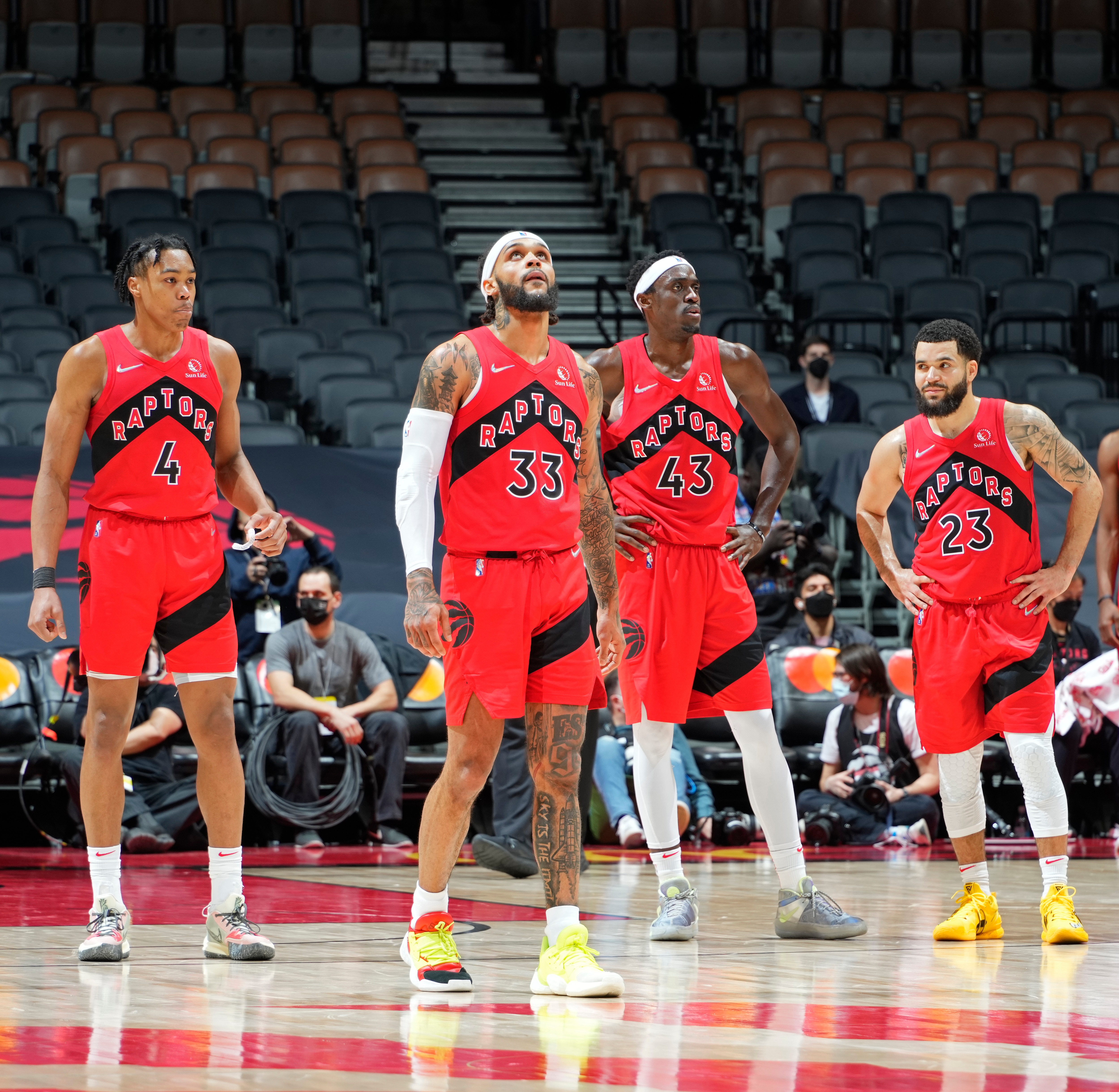 TORONTO, CANADA - FEBRUARY 1: Scottie Barnes #4, Gary Trent Jr. #33, Pascal Siakam #43 and Fred VanVleet #23 of the Toronto Raptors look on during the game against the Miami Heat on February 1, 2022 at the Scotiabank Arena in Toronto, Ontario, Canada.  NOTE TO USER: User expressly acknowledges and agrees that, by downloading and or using this Photograph, user is consenting to the terms and conditions of the Getty Images License Agreement.  Mandatory Copyright Notice: Copyright 2022 NBAE (Photo by Kevin Sousa/NBAE via Getty Images)