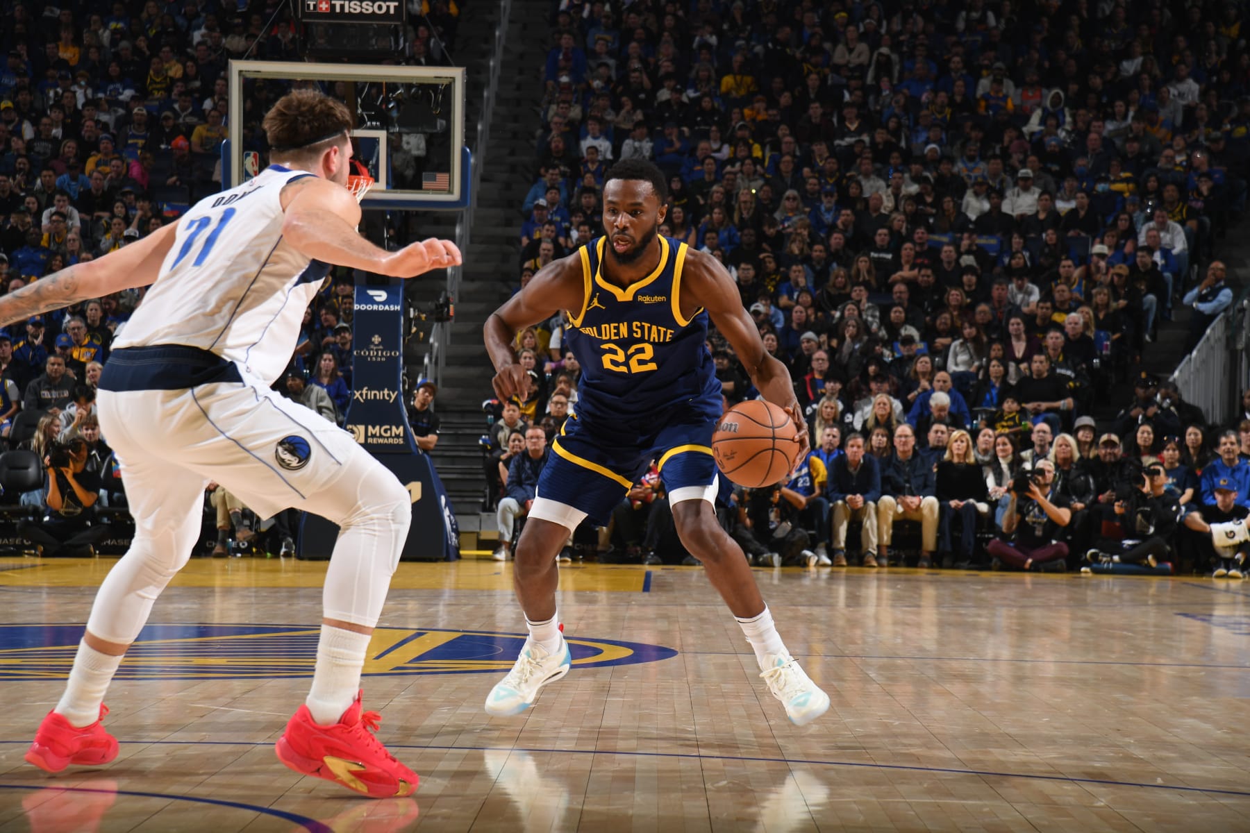 SAN FRANCISCO, CA - DECEMBER 30: Andrew Wiggins #22 of the Golden State Warriors dribbles the ball during the game against the Dallas Mavericks on December 30, 2023 at Chase Center in San Francisco, California. NOTE TO USER: User expressly acknowledges and agrees that, by downloading and or using this photograph, user is consenting to the terms and conditions of Getty Images License Agreement. Mandatory Copyright Notice: Copyright 2023 NBAE (Photo by Noah Graham/NBAE via Getty Images)