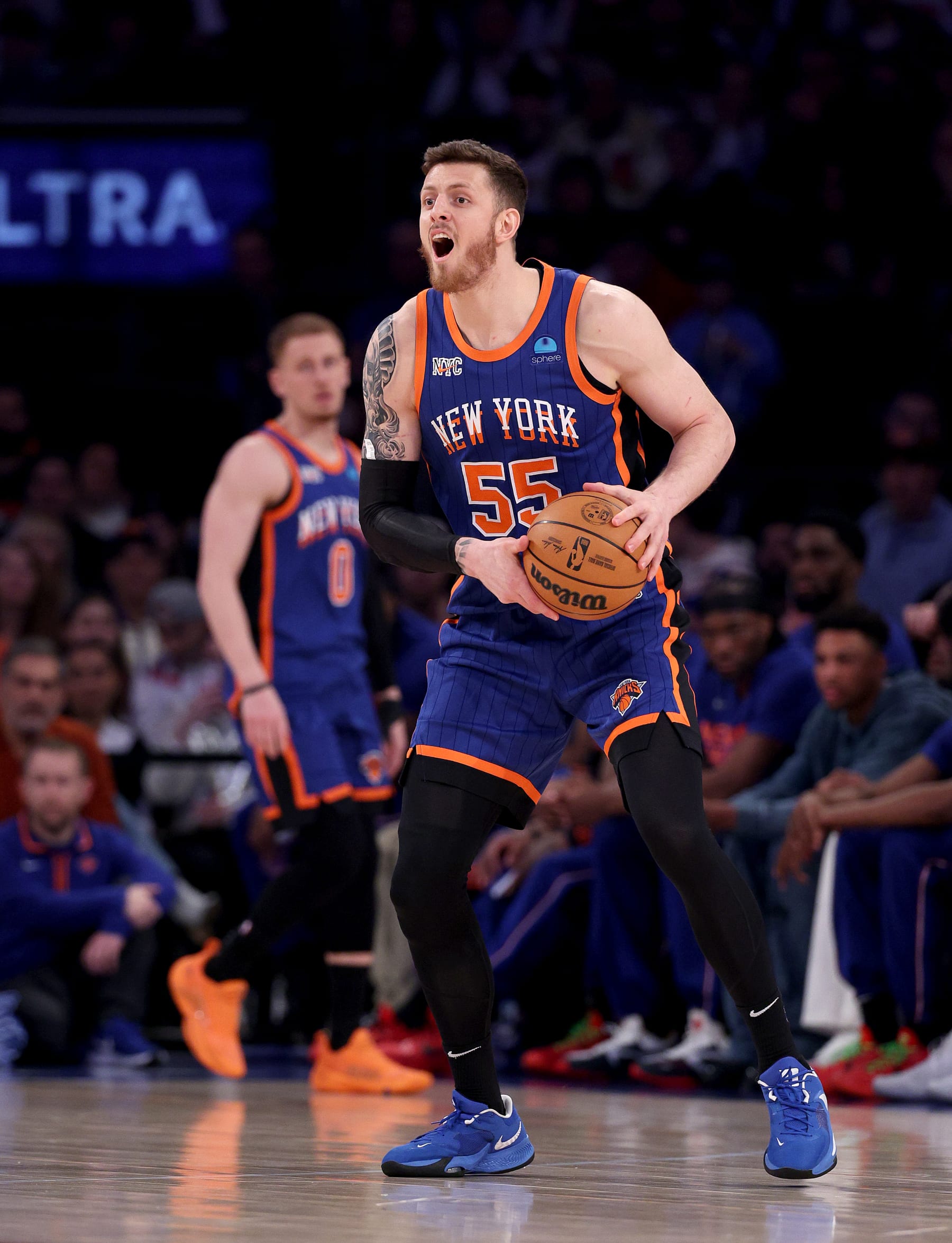 NEW YORK, NEW YORK - APRIL 30: Isaiah Hartenstein #55 of the New York Knicks reacts during the first half against the Philadelphia 76ers at Madison Square Garden on April 30, 2024 in New York City. NOTE TO USER: User expressly acknowledges and agrees that, by downloading and or using this photograph, User is consenting to the terms and conditions of the Getty Images License Agreement. (Photo by Elsa/Getty Images)