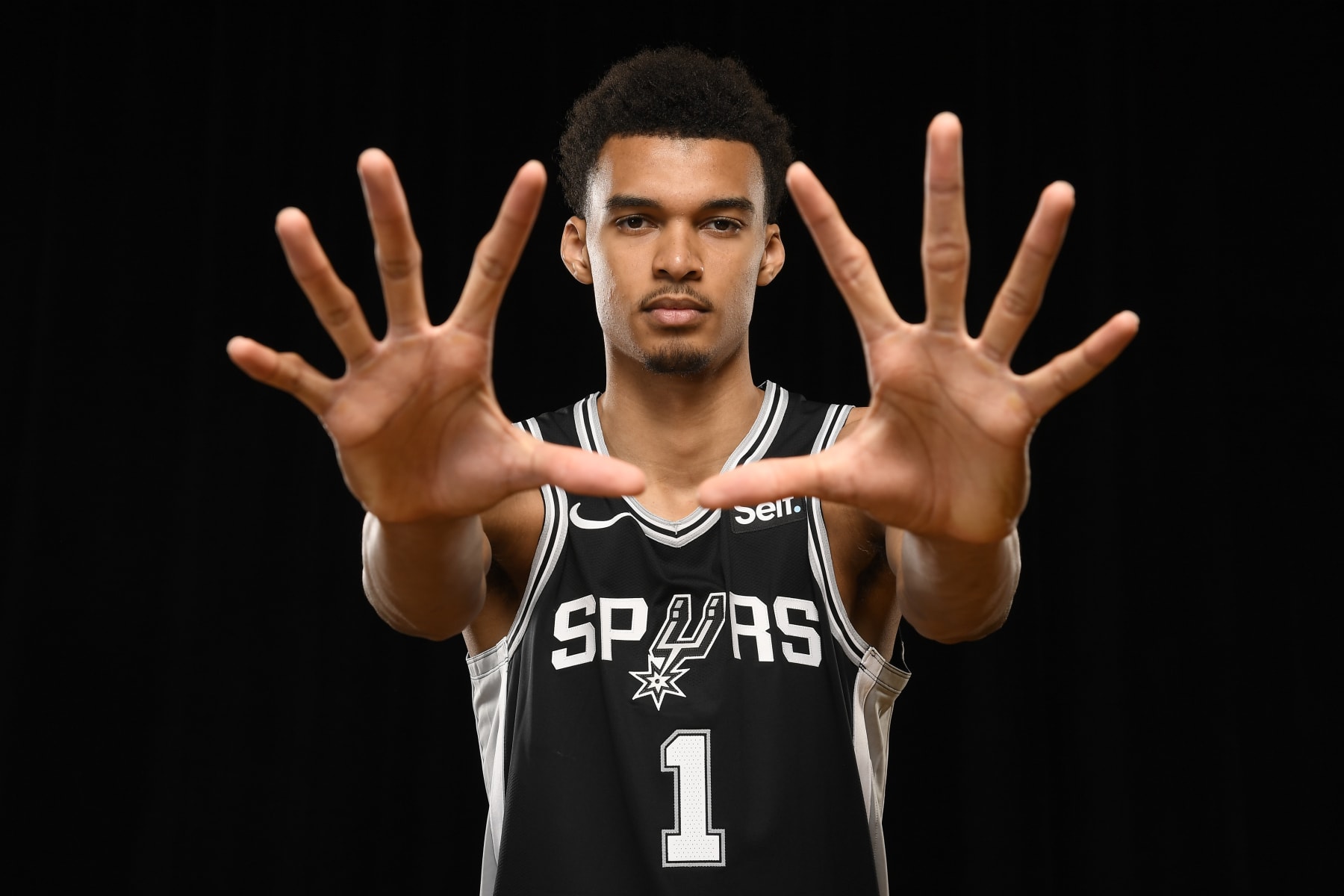 LAS VEGAS, NV - JULY 12: Victor Wembanyama #1 of the San Antonio Spurs for a portrait during the 2023 NBA Rookie Photo Shoot on July 12, 2023 at the University of Nevada, Las Vegas campus in Las Vegas, Nevada. NOTE TO USER: User expressly acknowledges and agrees that, by downloading and/or using this Photograph, user is consenting to the terms and conditions of the Getty Images License Agreement. Mandatory Copyright Notice: Copyright 2023 NBAE (Photo by Brian Babineau/NBAE via Getty Images)
