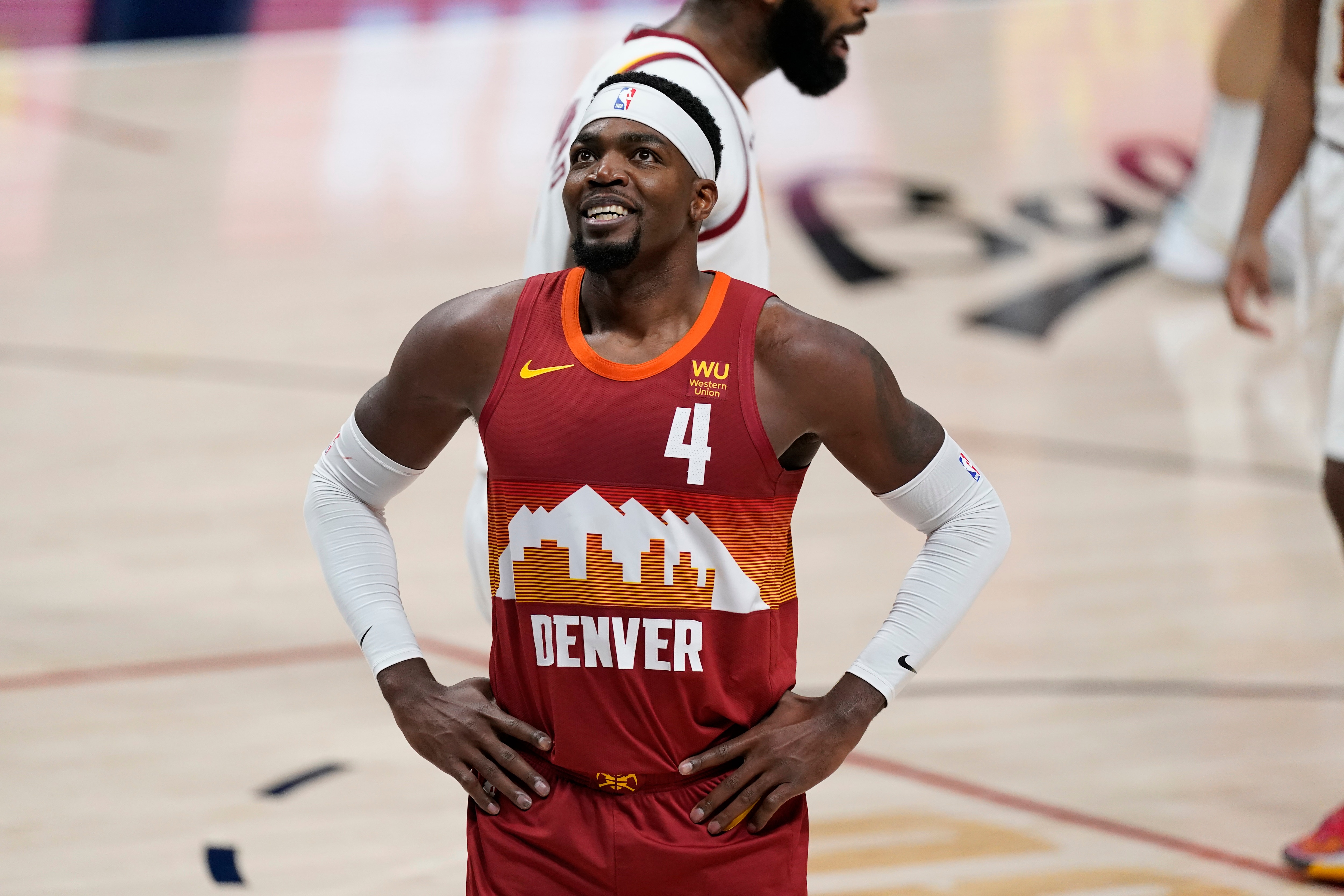 Denver Nuggets forward Paul Millsap (4) in the first half of an NBA basketball game Wednesday, Feb. 10, 2021, in Denver. (AP Photo/David Zalubowski)