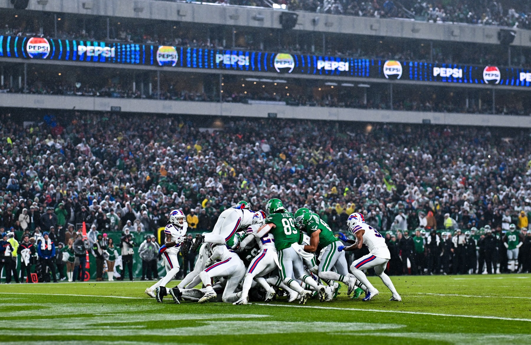 Eagles QB Jalen Hurts scores a touchdown against the Bills.