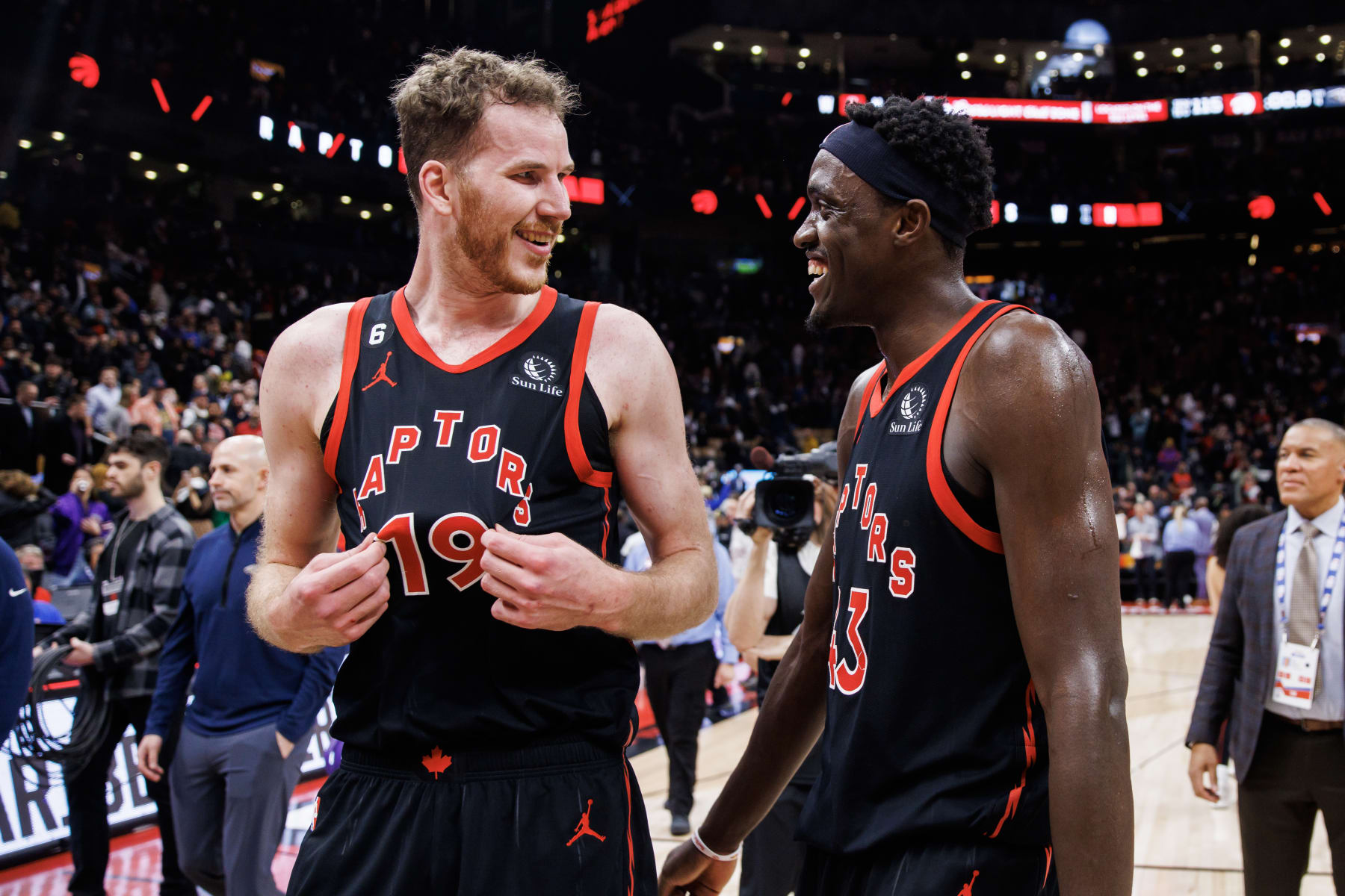 TORONTO, ON - FEBRUARY 23: Jakob Poeltl #19 and Pascal Siakam #43 of the Toronto Raptors celebrate after their NBA game against the New Orleans Pelicans at Scotiabank Arena on February 23, 2023 in Toronto, Canada. NOTE TO USER: User expressly acknowledges and agrees that, by downloading and or using this photograph, User is consenting to the terms and conditions of the Getty Images License Agreement. (Photo by Cole Burston/Getty Images)