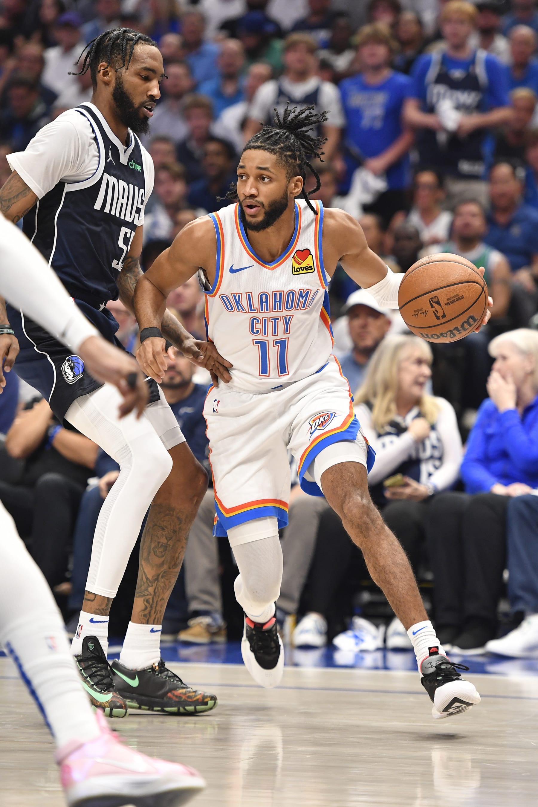 DALLAS, TX - MAY 13: Isaiah Joe #11 of the Oklahoma City Thunder handles the ball during the game against the Dallas Mavericks during Round 2 Game 4 of the 2024 NBA Playoffs on May 13, 2024 at the American Airlines Center in Dallas, Texas. NOTE TO USER: User expressly acknowledges and agrees that, by downloading and or using this photograph, User is consenting to the terms and conditions of the Getty Images License Agreement. Mandatory Copyright Notice: Copyright 2024 NBAE (Photo by Logan Riely/NBAE via Getty Images)