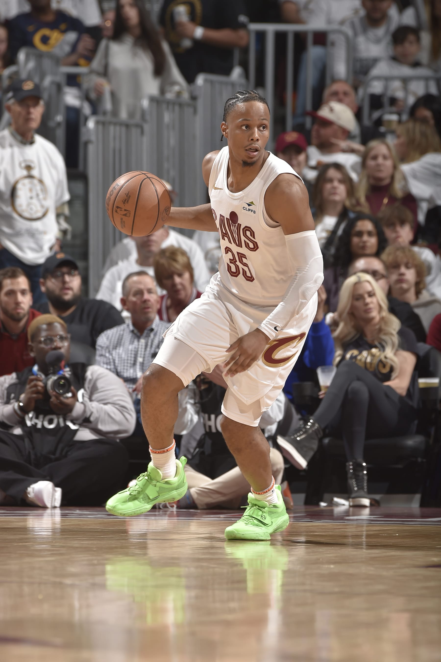 CLEVELAND, OH - MAY 11: Isaac Okoro #35 of the Cleveland Cavaliers dribbles the ball during the game against the Boston Celtics during Round 2 Game 3 of the 2024 NBA Playoffs on May 11, 2024 at Rocket Mortgage FieldHouse in Cleveland, Ohio. NOTE TO USER: User expressly acknowledges and agrees that, by downloading and/or using this Photograph, user is consenting to the terms and conditions of the Getty Images License Agreement. Mandatory Copyright Notice: Copyright 2024 NBAE (Photo by David Liam Kyle/NBAE via Getty Images)