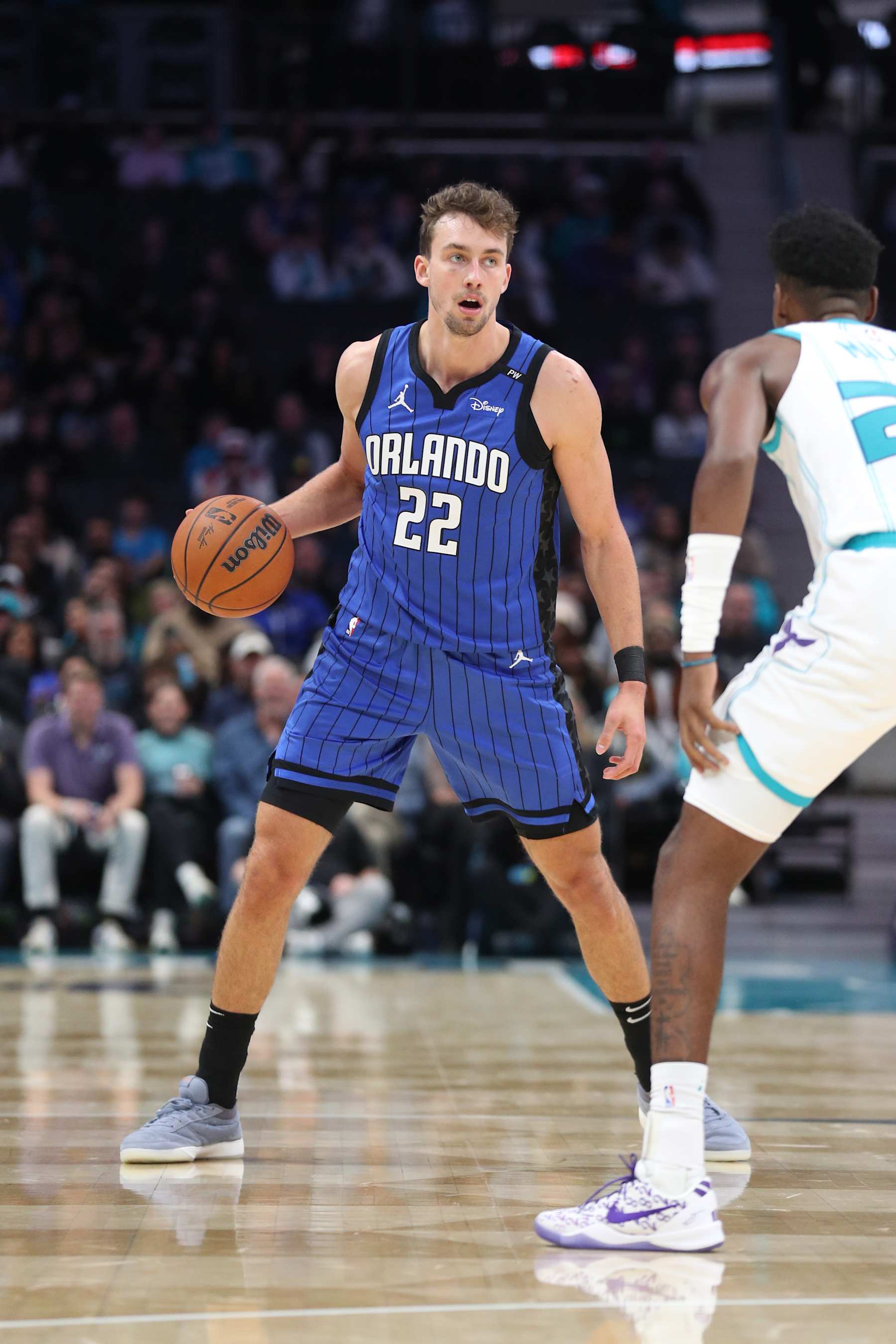 CHARLOTTE, NC -NOVEMBER 25: Franz Wagner #22 of the Orlando Magic handles the ball during the game against the Charlotte Hornets  on November 25, 2024 at Spectrum Center in Charlotte, North Carolina. NOTE TO USER: User expressly acknowledges and agrees that, by downloading and or using this photograph, User is consenting to the terms and conditions of the Getty Images License Agreement. Mandatory Copyright Notice: Copyright 2024 NBAE (Photo by Brock Williams-Smith/NBAE via Getty Images)