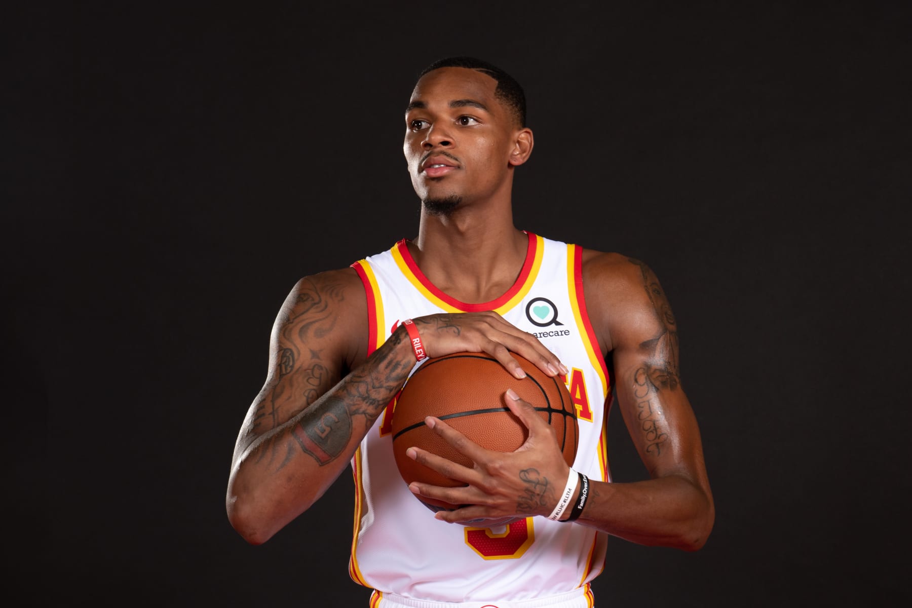 ATLANTA, GA - JULY 1: Dejounte Murray poses for a portrait after the introductory draft press conference on July 1, 2022 at State Farm Arena in Atlanta, Georgia.  NOTE TO USER: User expressly acknowledges and agrees that, by downloading and/or using this Photograph, user is consenting to the terms and conditions of the Getty Images License Agreement. Mandatory Copyright Notice: Copyright 2022 NBAE (Photo by Adam Hagy/NBAE via Getty Images)