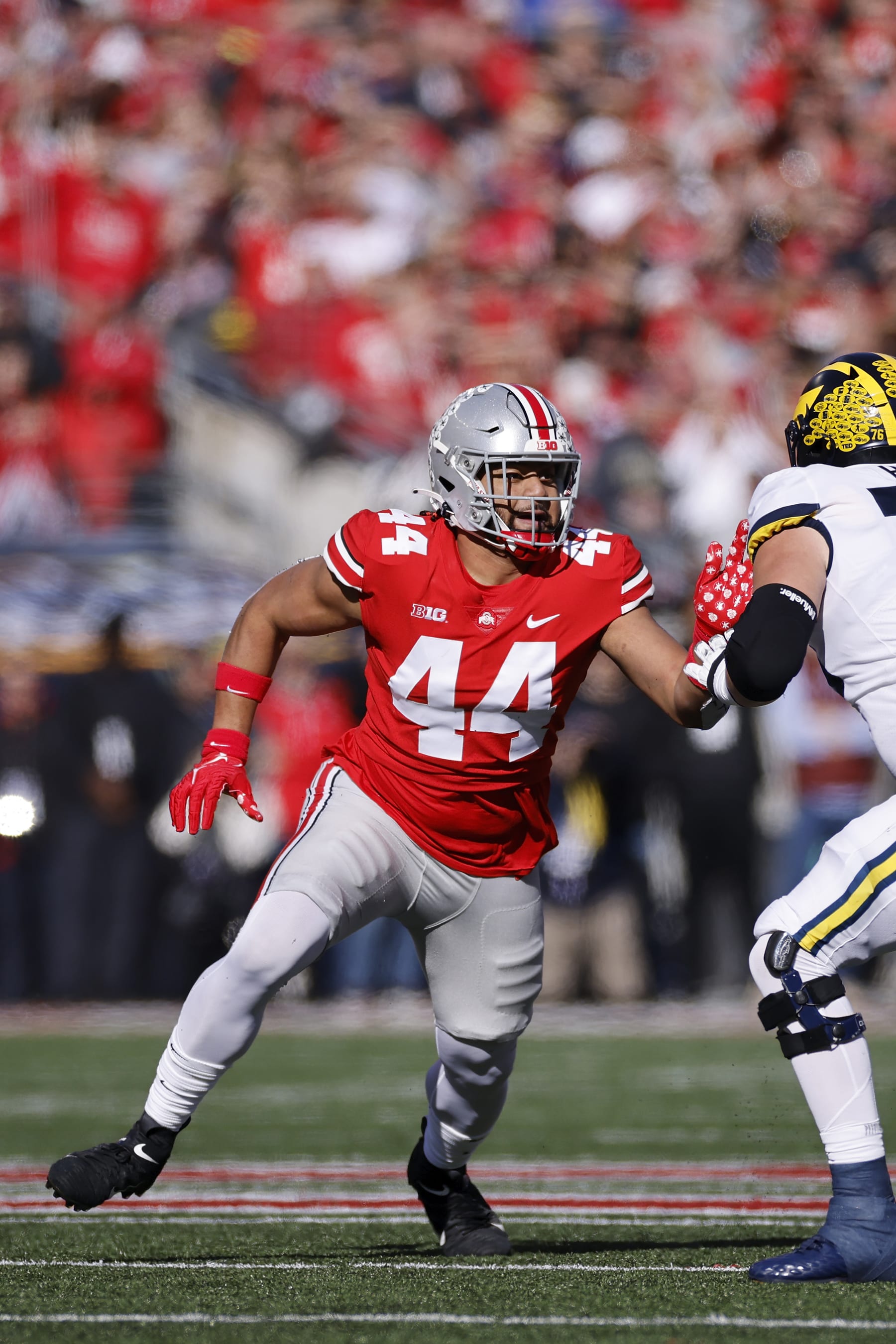 COLUMBUS, OH - NOVEMBER 26: Ohio State Buckeyes defensive end J.T. Tuimoloau (44) rushes on defense during a college football game against the Michigan Wolverines on November 26, 2022 at Ohio Stadium in Columbus, Ohio. (Photo by Joe Robbins/Icon Sportswire via Getty Images)